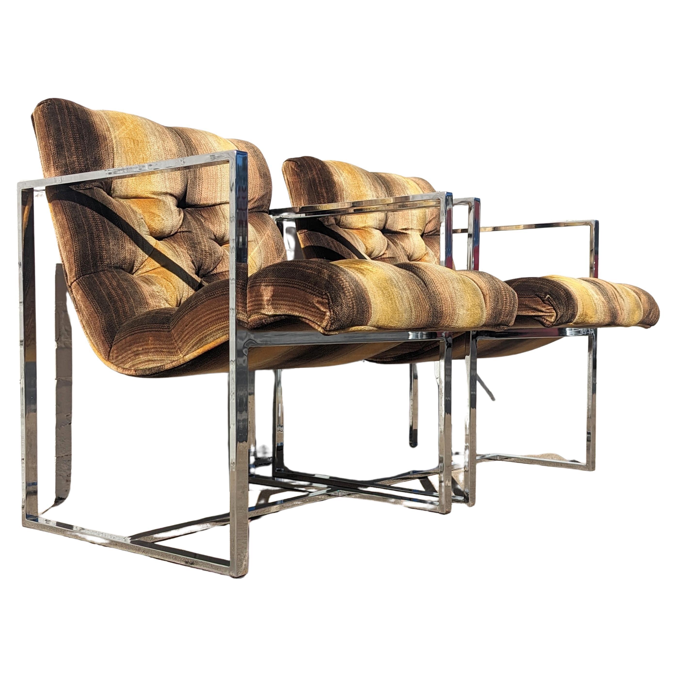 Milo Baughman stainless steel and velvet scoop chairs.  Above average condition and structurally sound. Stainless steel frames have very little wear. I believe this to be the original fabric and it has very little wear with no cuts or tears. There