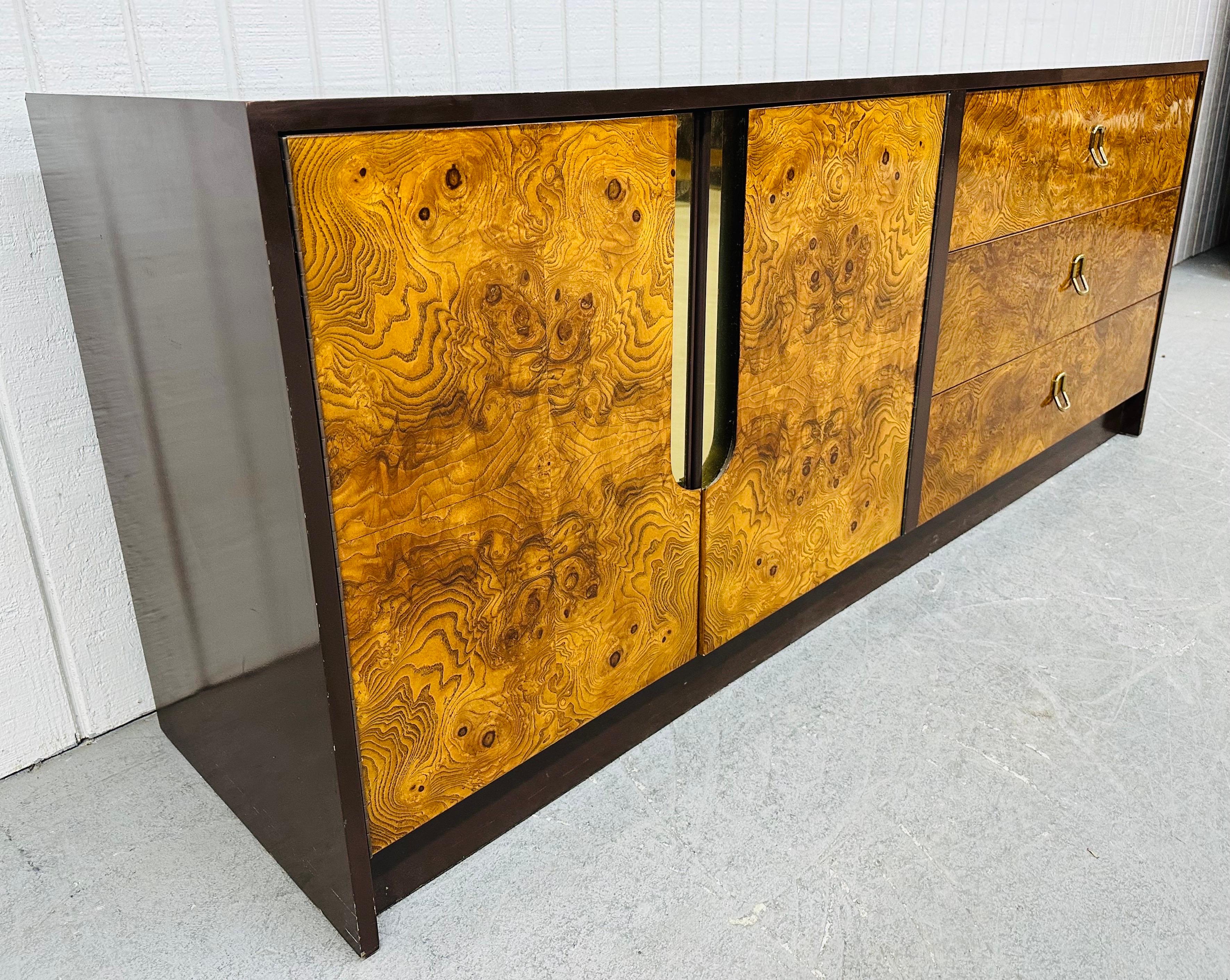 This listing is for a Mid-Century Modern Milo Baughman Style Burled Wood Dresser. Featuring a straight line design, two large doors at the left that open up to three hidden drawers, three drawers on the right with brass hardware, and a brown lacquer