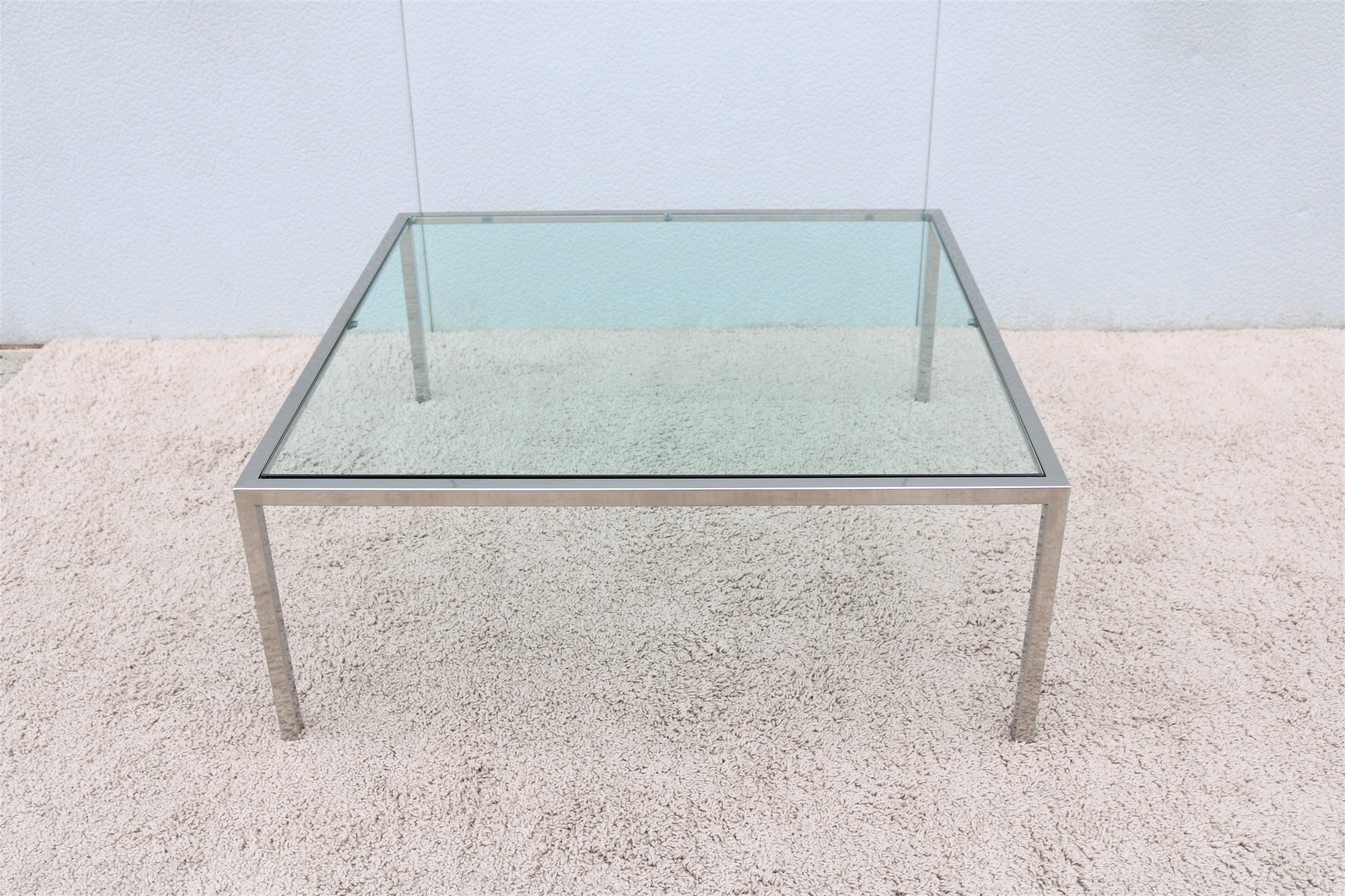 Stunning and elegant looking Mid-Century Modern Milo Baughman style polished Stainless Steel and inset glass top square Coffee Table.
Fine quality and beautiful craftmanship make this table attractive center piece for living