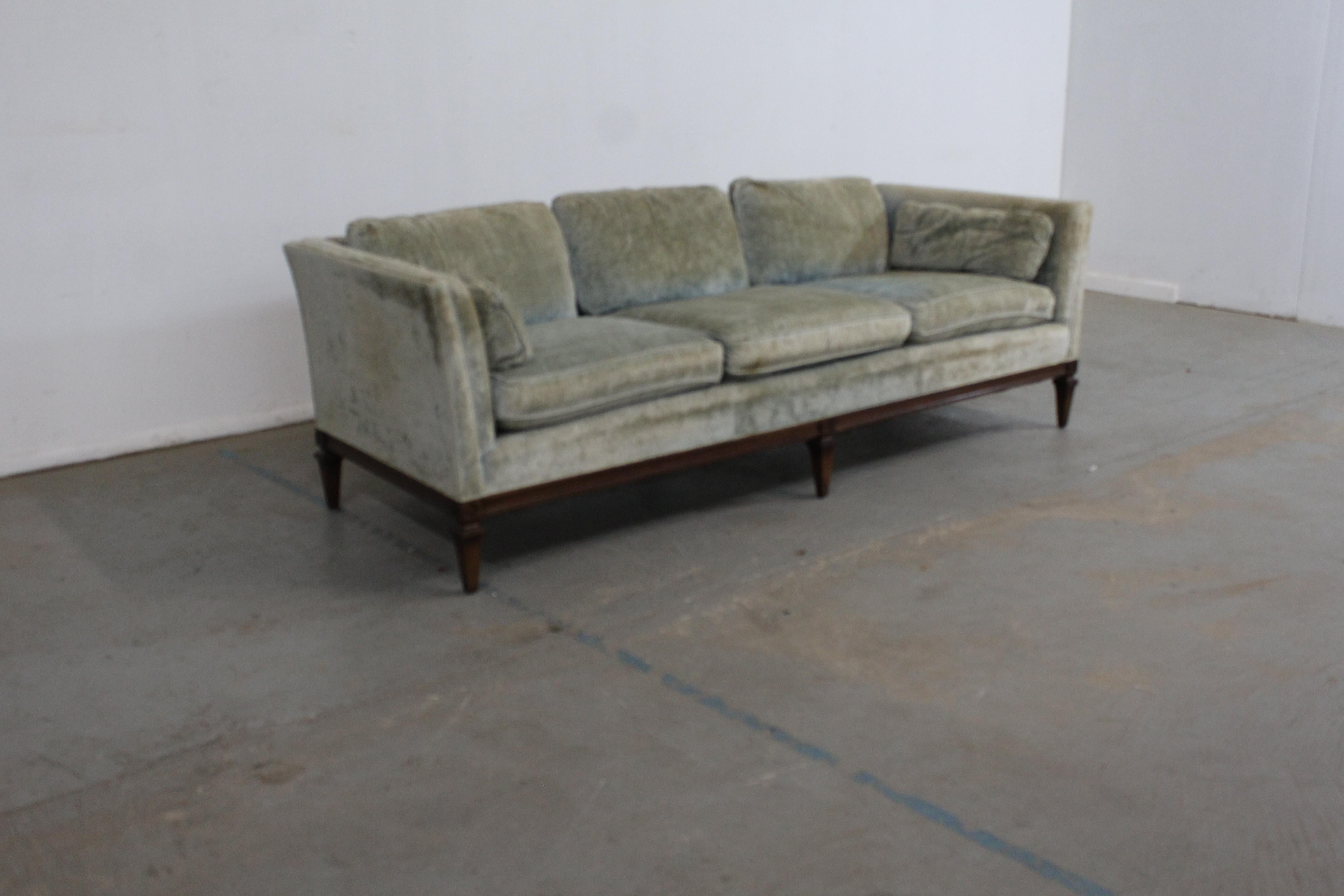 Mid-Century Modern Milo Baughman style sofa

Offered is a Mid-Century Modern sofa with tapered legs. Has 3 removable seat cushions and 3 back cushions. It is in great structurally sound condition considering its age with torn upholstery. This item