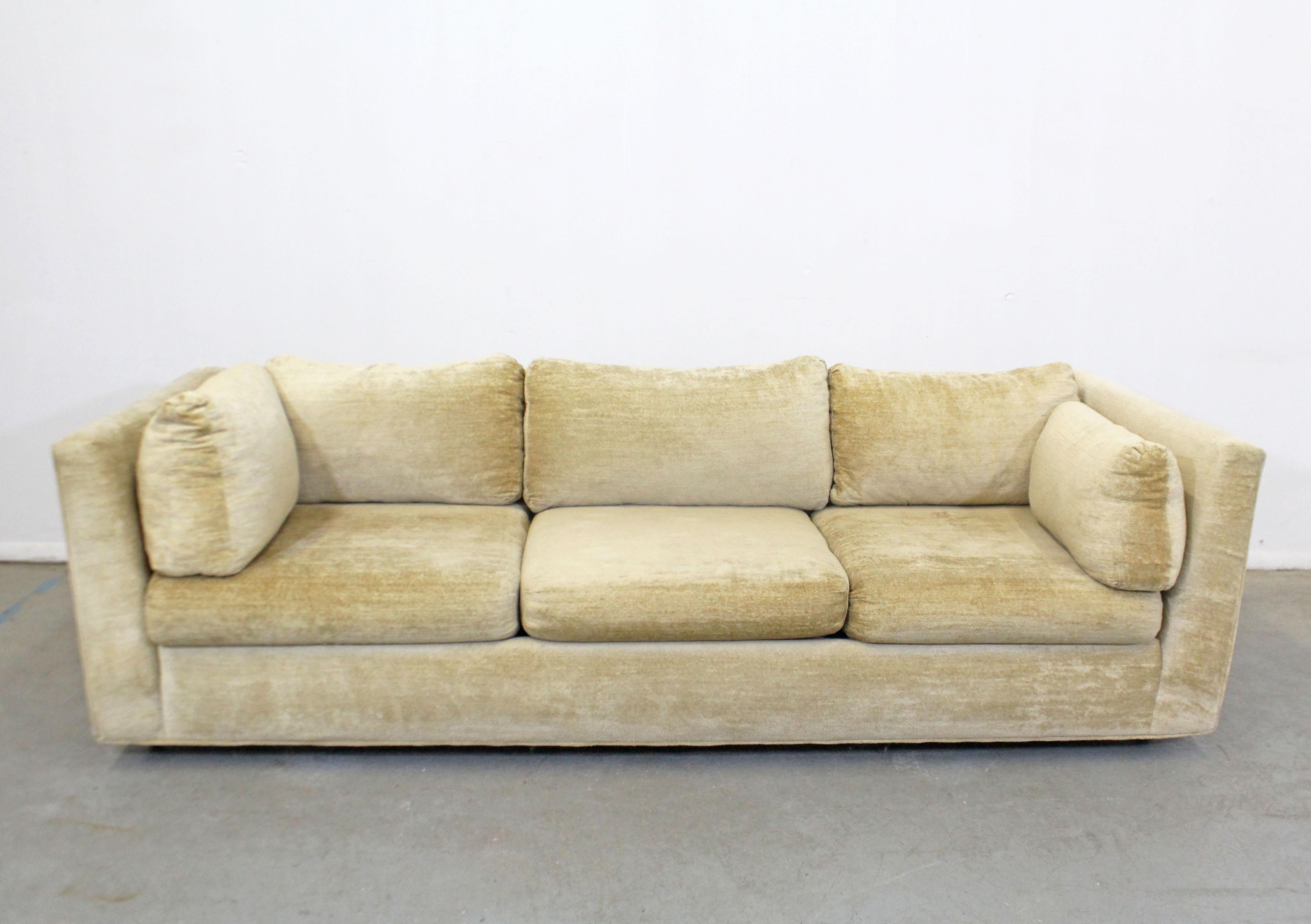 What a find. Offered is a vintage Mid-Century Modern sofa similar to the style of Milo Baughman, made by Stratford Designs. This is a three-seat sofa with sleek, modern lines. It is in good vintage condition with some age wear and fading on the