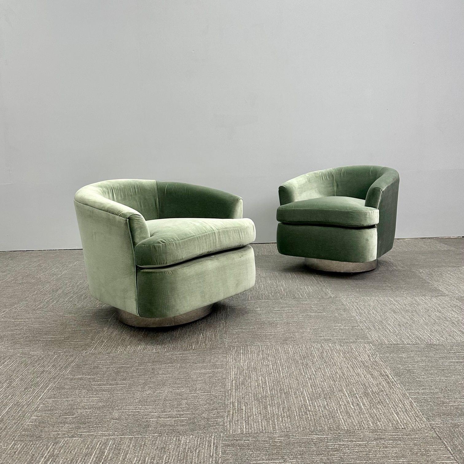 Mid-Century Modern Milo Baughman Style Swivel Chairs, Chrome Base, Green Velvet
 
Pair of hand crafted modern Milo Baughman inspired swivel chairs having a chrome finished base and soft green velvet upholstery. This chair sits about 3 inches off the