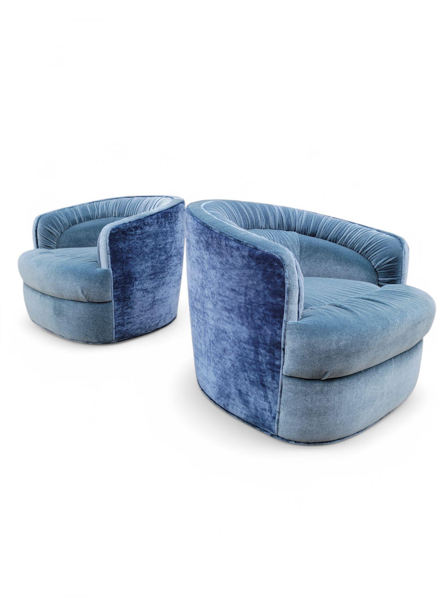 Mid Century Modern Milo Baughman Style Barrel Back Swivel Lounge Chairs Newly Upholstered In SeaFoam Pleaded Mohair & Crushed AquaBlu Velvet - Pair

These chairs not only offer a stylish nod to classic design but also provide exceptional comfort