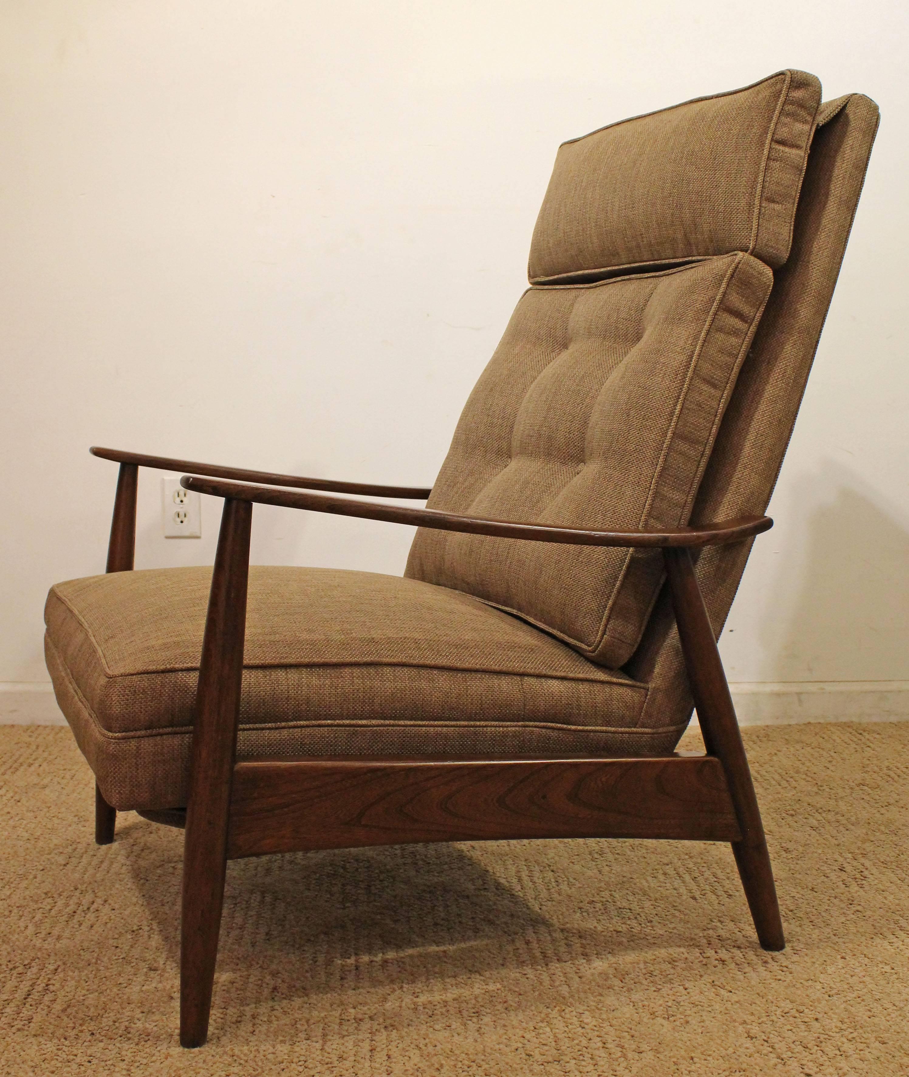 This piece was designed by Milo Baughman for James Inc. It is made of walnut and reclines. It is in excellent condition, has been completely restored.

Approximate dimensions:
chair: 28