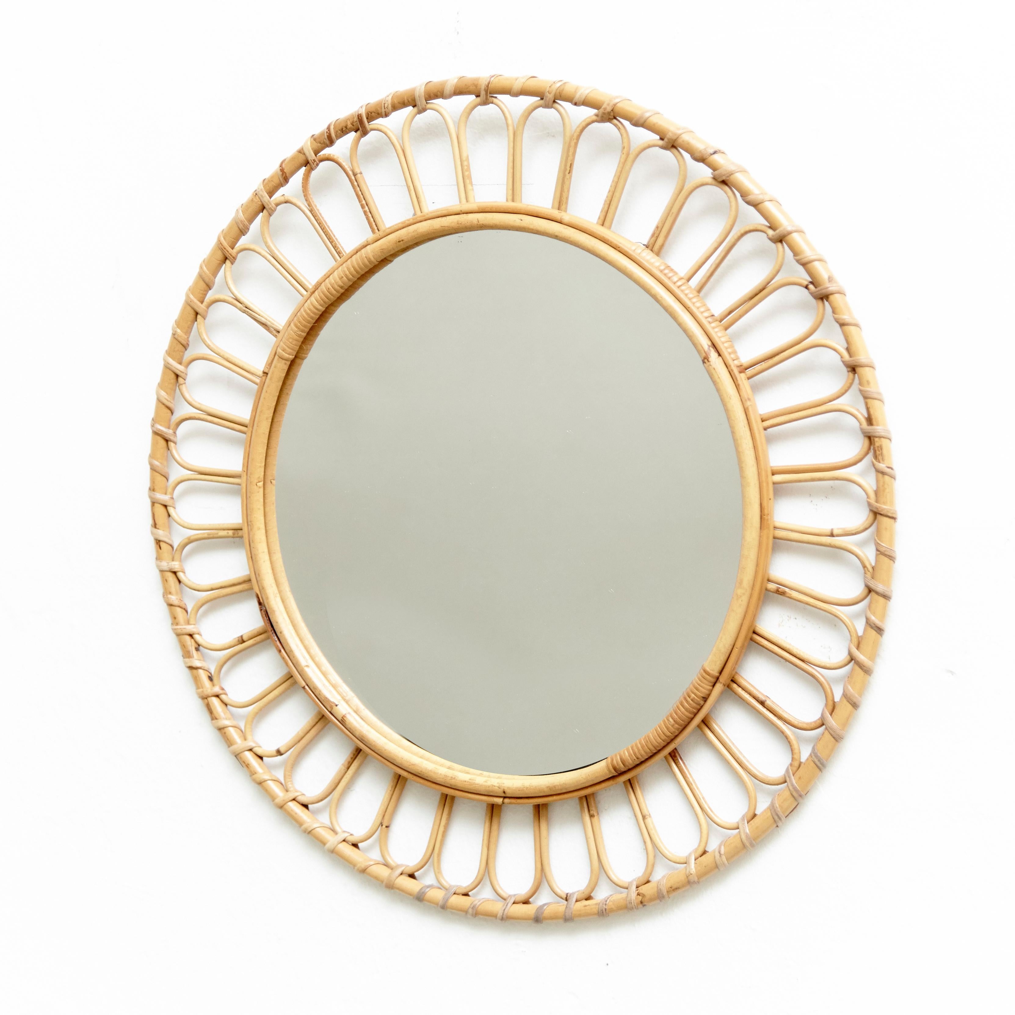 Mid-Century Modern mirror bamboo and rattan handcrafted, circa 1960
Traditionally manufactured in France.
By unknown designer.

In original condition with minor wear consistent of age and use, preserving a beautiful patina.

  