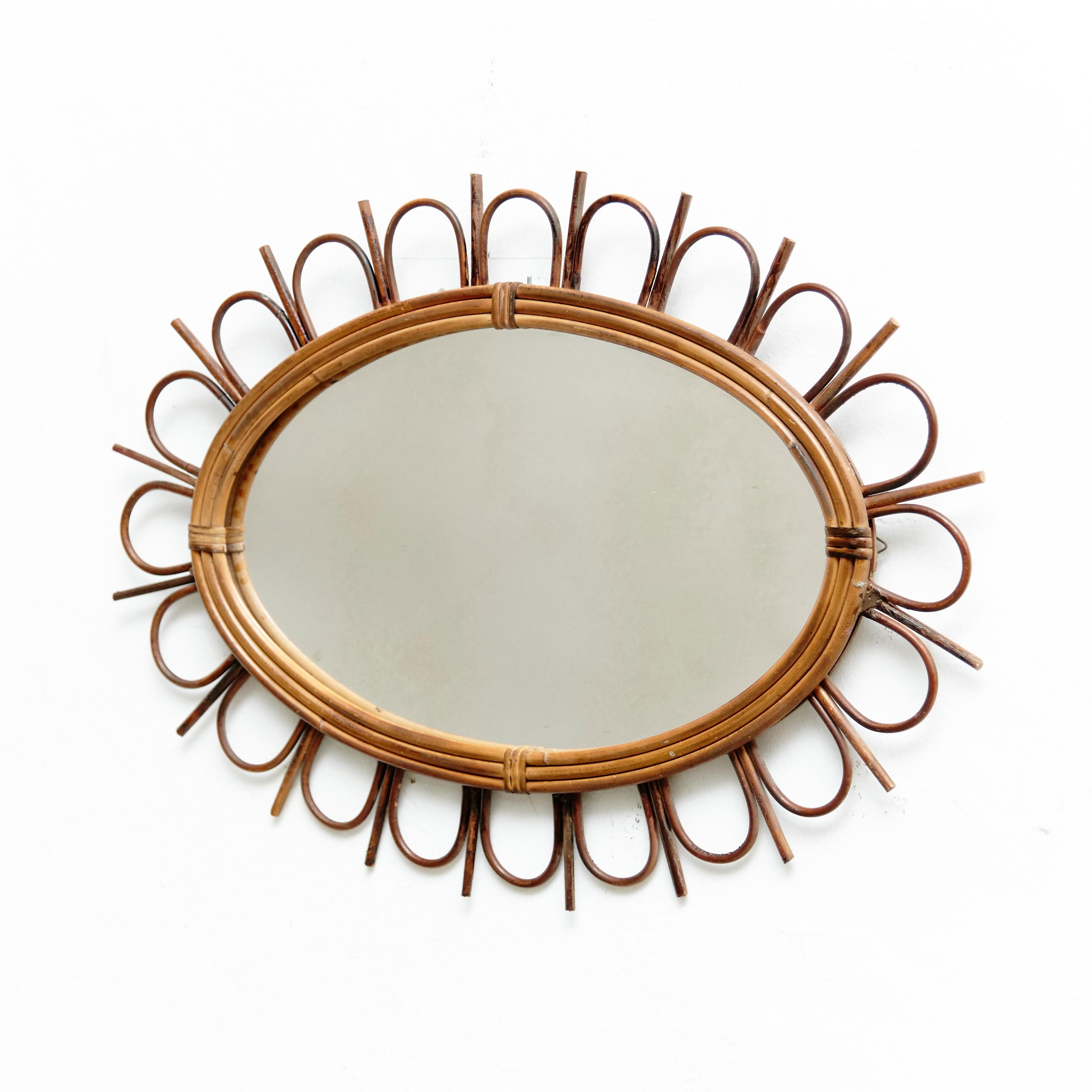 Mid-Century Modern mirror bamboo and rattan handcrafted, circa 1960
Traditionally manufactured in France.
By unknown designer.

In original condition with minor wear consistent of age and use, preserving a beautiful patina.

  