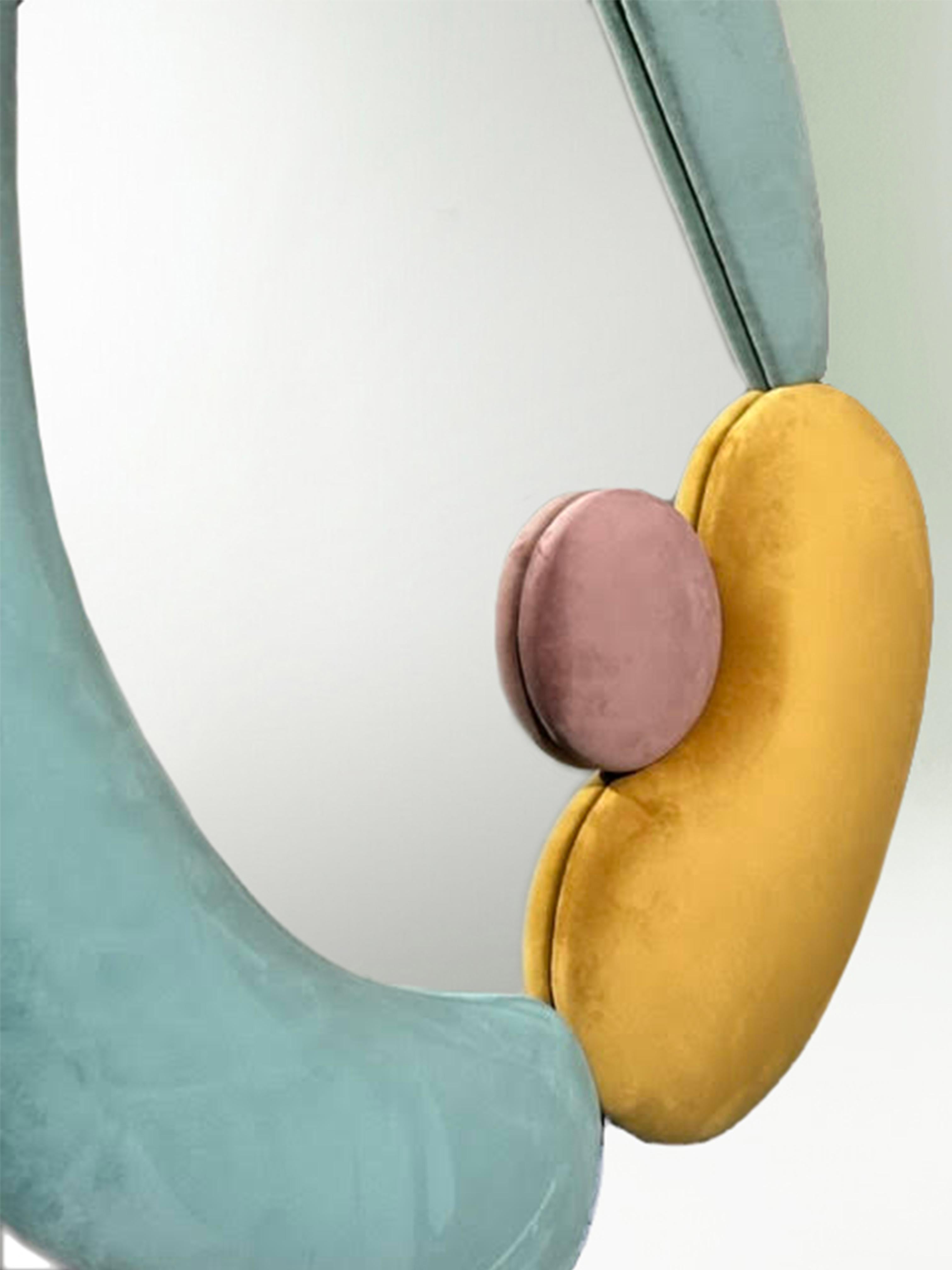 The Nube mirror is a fun piece made up of organic and geometric volumes, simulating a colorful party in the clouds, alluding to the imaginary world of Sergio Prieto, allowing us to see ourselves reflected in it. 
This is a piece made entirely by