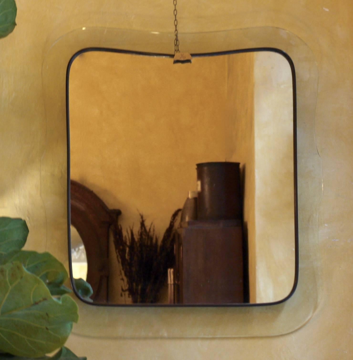 Luigi Fontana, before founding Fontana Arte, made this mirror in 1940 in Milan.
Stamped with two crossed swords on the top front.