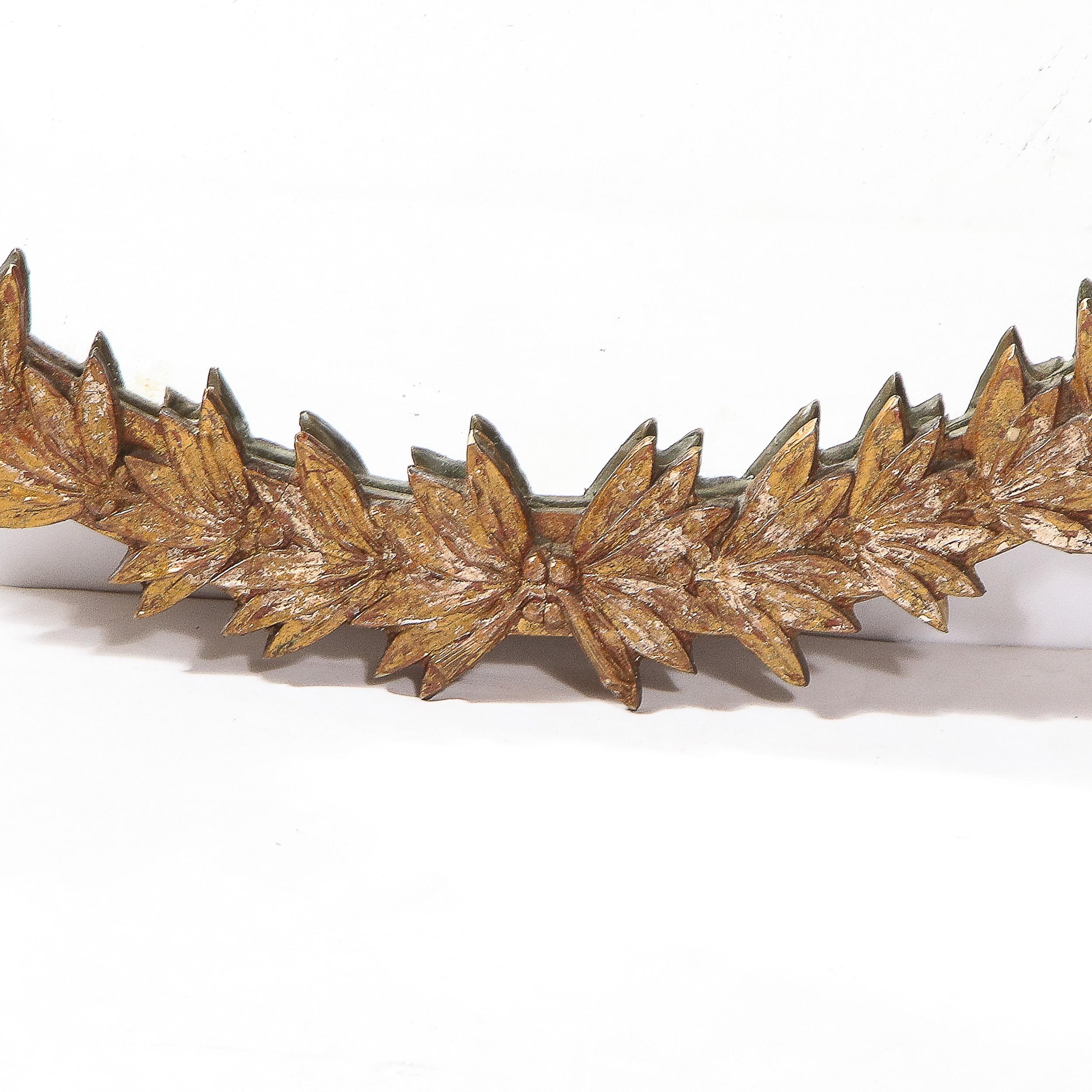 Mid-Century Modern Mirror with Stylized Bronze Foliate Laurel Detailing In Good Condition For Sale In New York, NY
