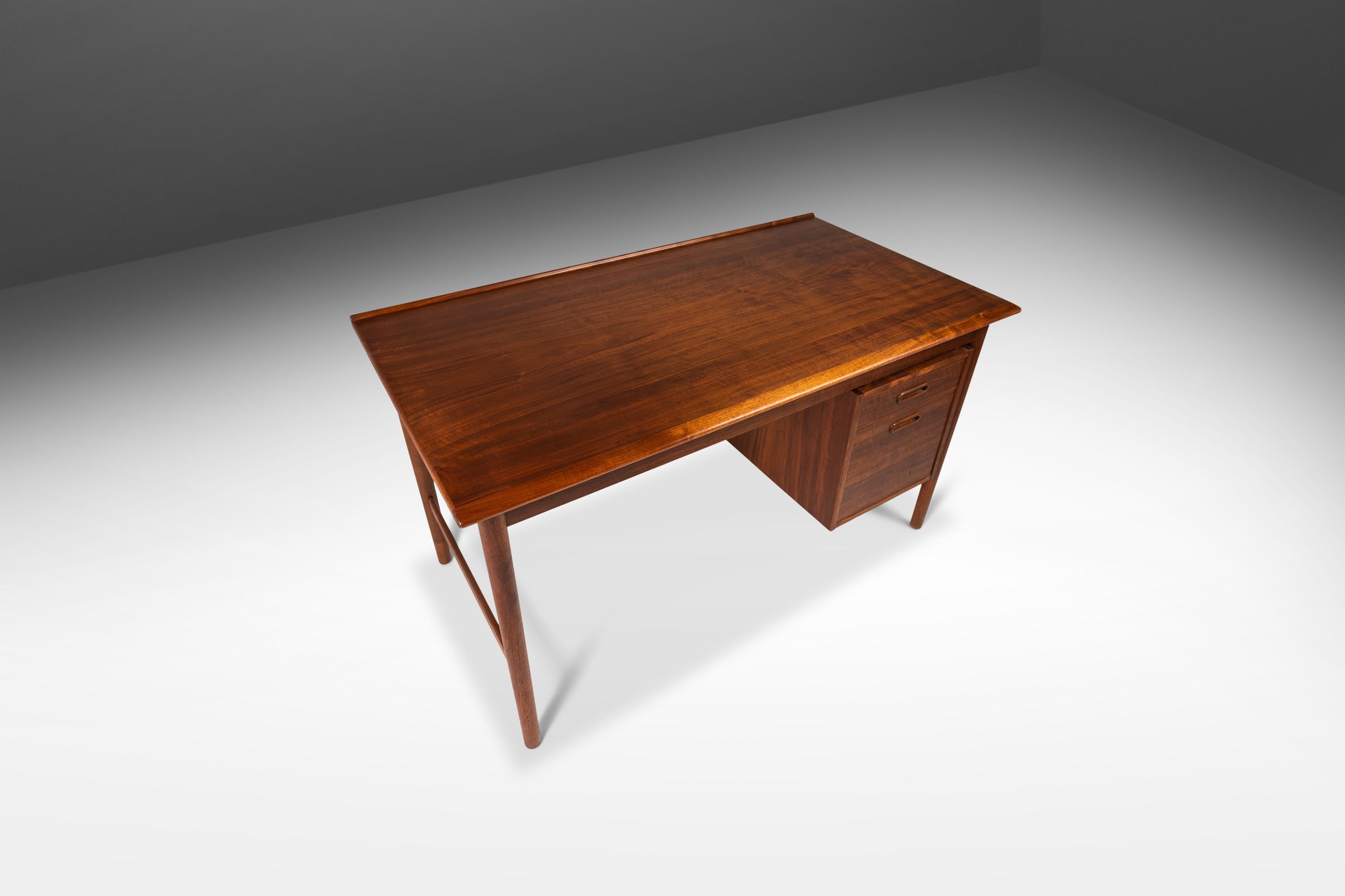 Introducing a true Scandinavian Modern treasure: a rare Model 541 Writing Desk designed by the influential Folke Ohlsson for DUX. In original, vintage condition this exceptionally beautiful writing desk is perfect for collectors and designers alike.