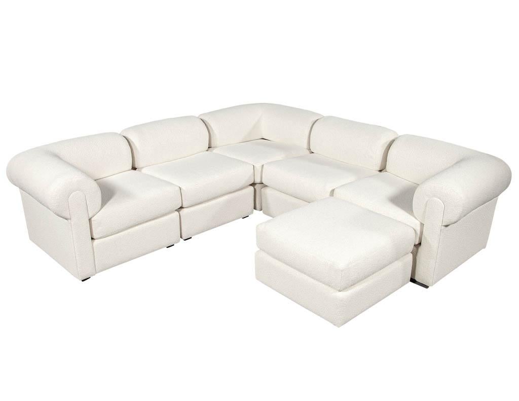 Mid-Century Modern modular sofa upholstered in boucle fabric. In the style of Directional. Recently fully restored by Carrocel in a high-quality white Boucle designer fabric. Featuring fully modular design with ability to configure your perfect