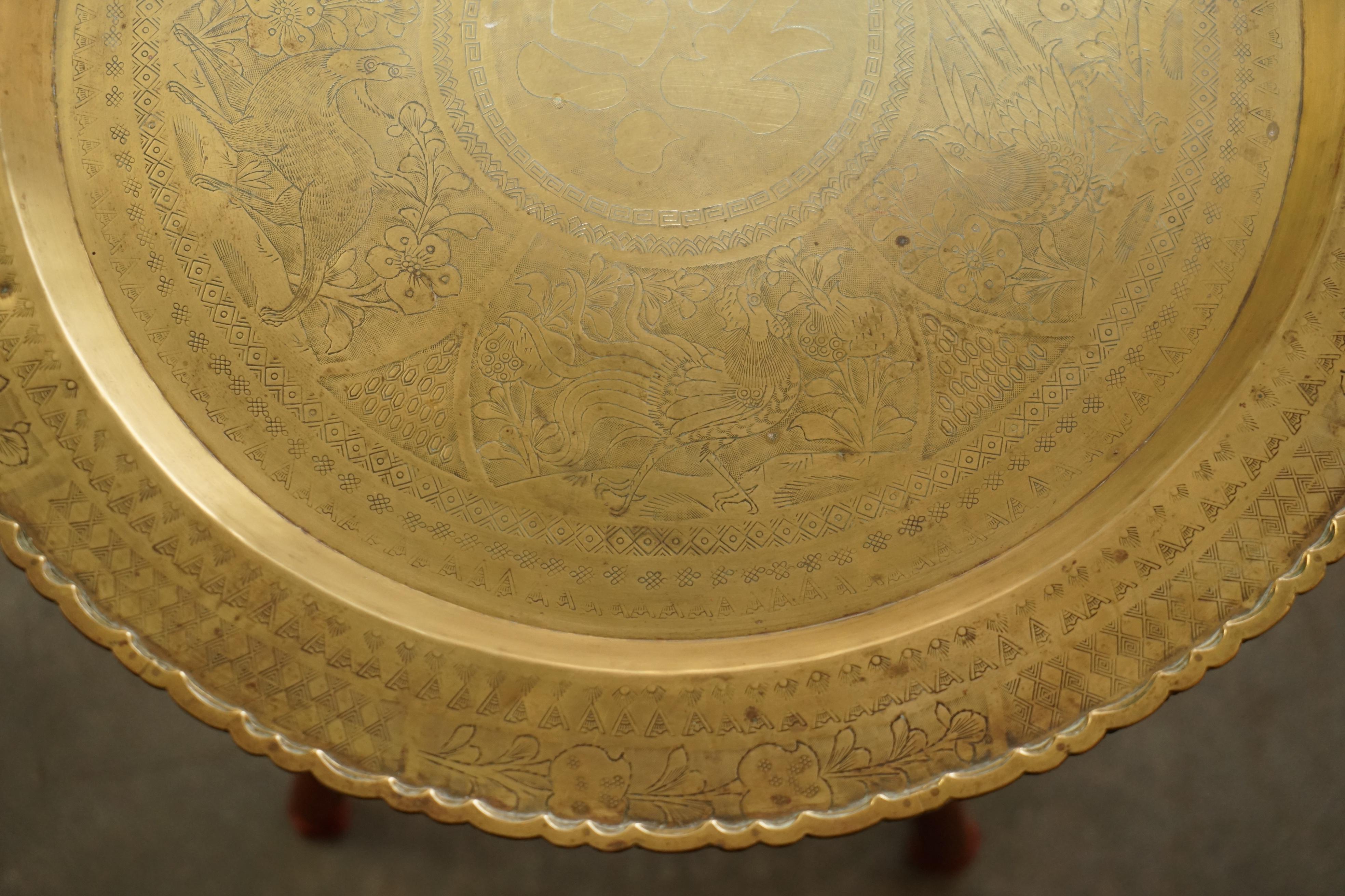 Early 20th Century MID CENTURY MODERN MOROCCAN BRASS TRAY TABLE WITH TEAK FOLDING BASe For Sale
