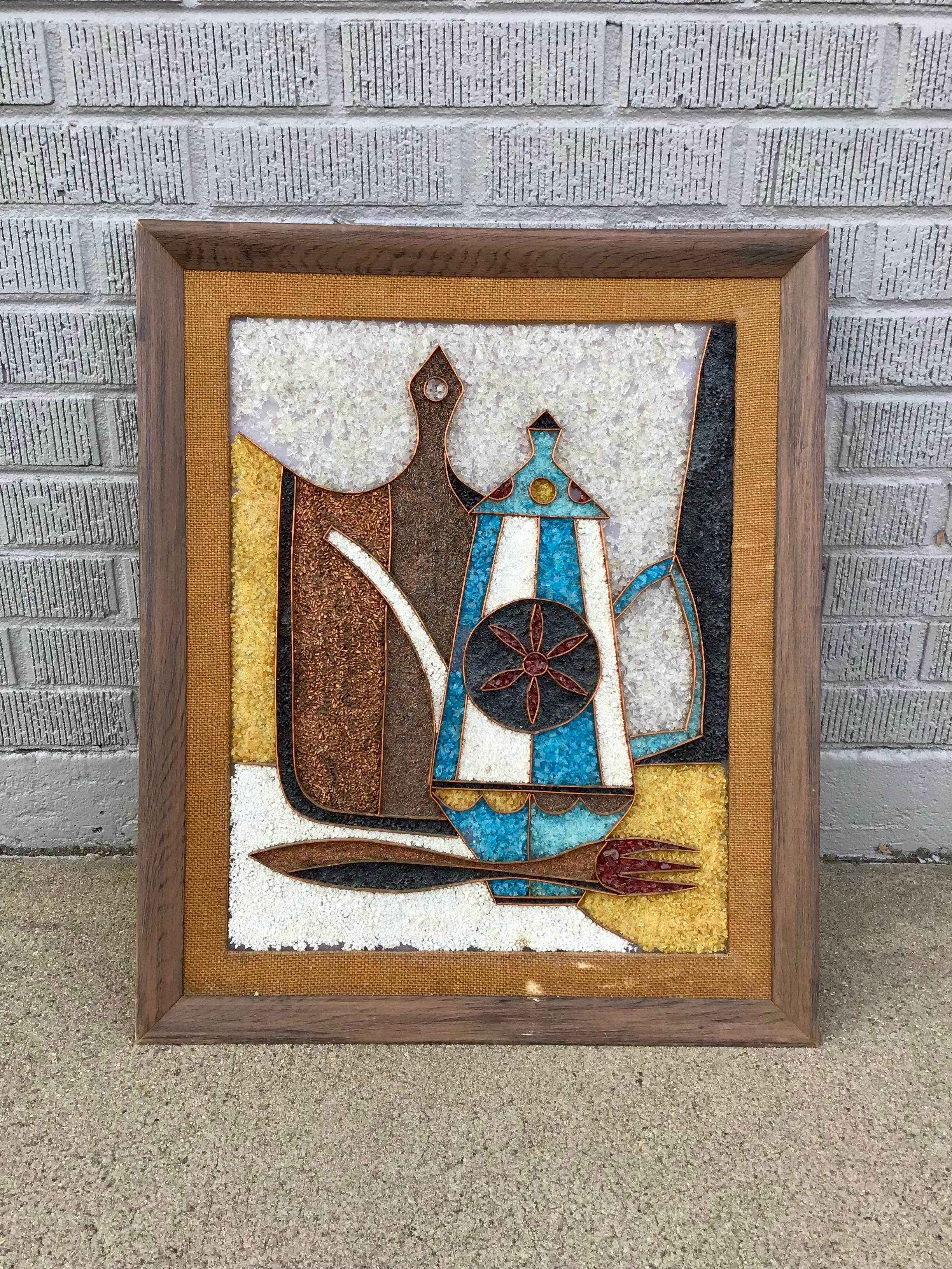 A one-of-a-kind handmade mosaic art piece circa 1960s with brilliant shades of browns, copper, amber, turquoise and white. Intricate beading, mixed metal, glass, and copper make up this unique mid-century modern artwork in a wooden frame and woven
