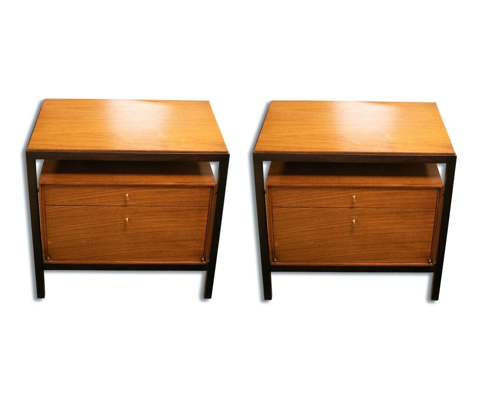 Elevate your bedroom decor with the Mount Airy Pair of Walnut Nightstands, a stunning addition to any bedside. Crafted with precision and style, these nightstands boast a rich walnut finish that exudes warmth and elegance. The clean lines and sleek