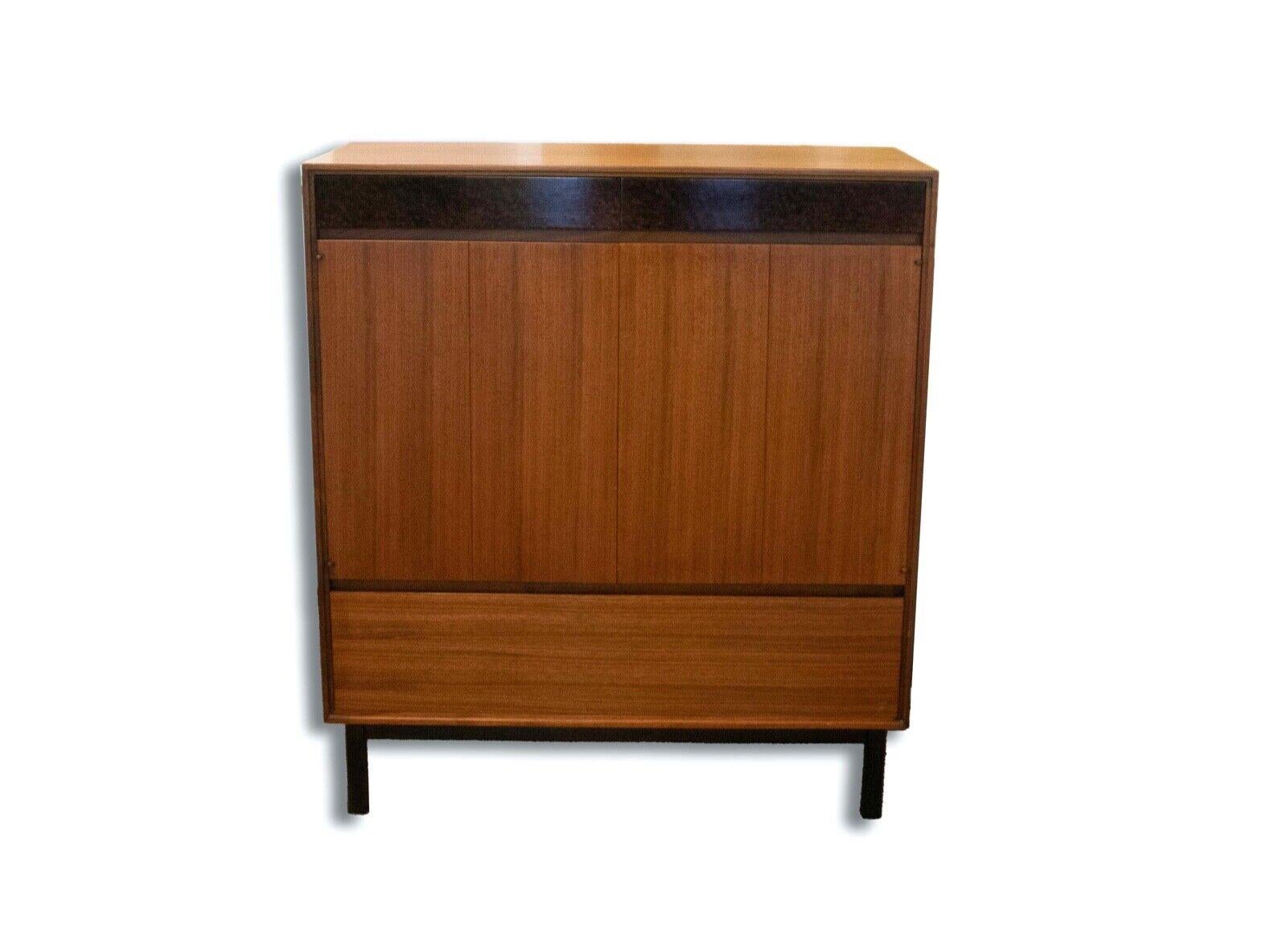 Introduce elegance and practicality to your bedroom with the Mount Airy Walnut Hi-Boy. This exquisite piece of furniture combines the beauty of walnut wood with a tall and slender design. The rich walnut finish adds warmth and sophistication to any