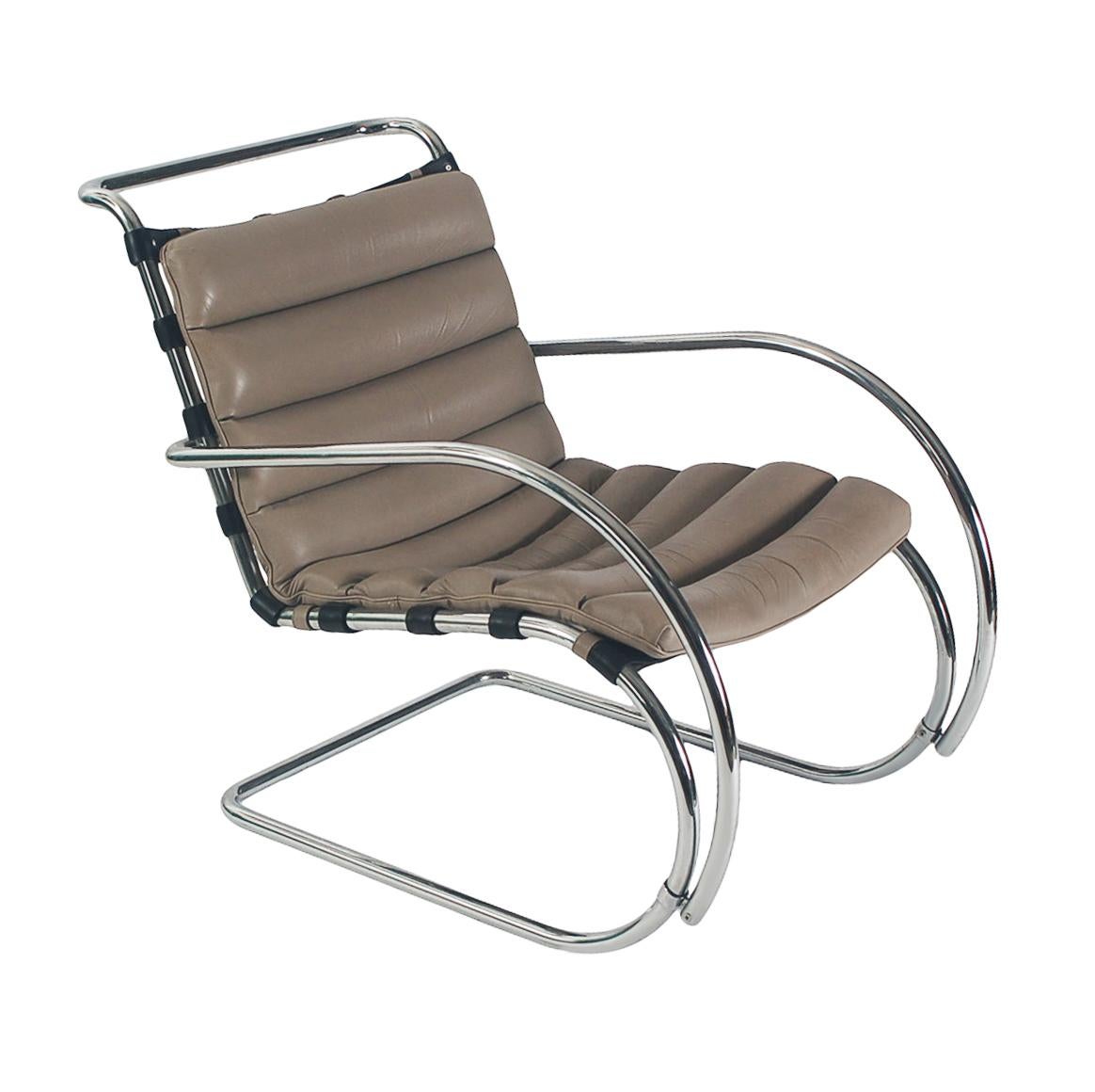 A lovely classic pair MR lounge chairs designed by Mies van der Rohe and produced by Stendig circa 1970's These feature chromed steel cantilever chair frames with gray leather seat cushions and black buckle straps. Manufacturers labels. Nice clean