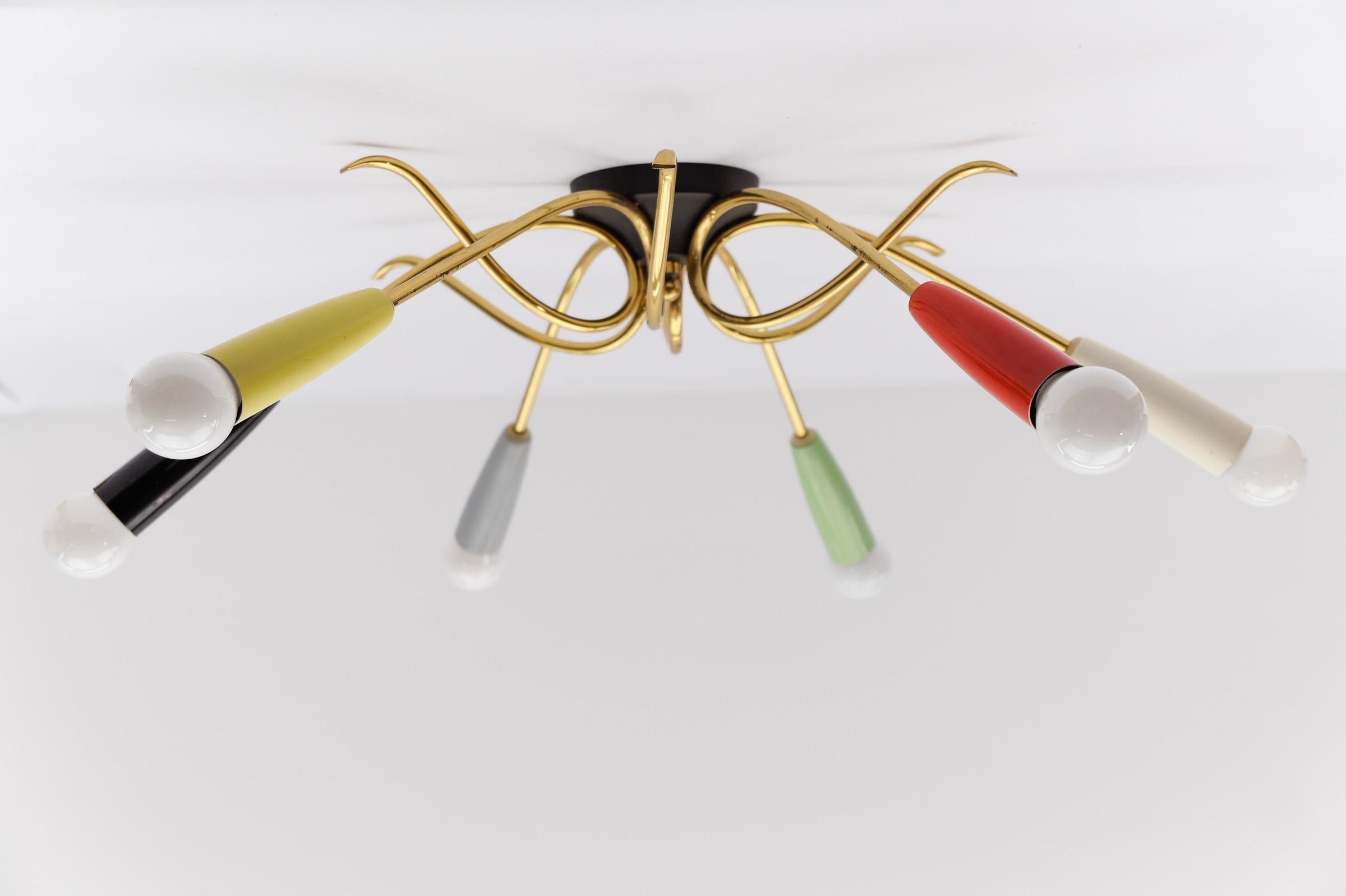 Lámpara sputnik de latón multicolor de 6 brazos, Moderna de mediados de siglo, años 50

Con bonita pátina original de mediados de siglo. Poco desde el uso.

Rara y elegante lámpara Sputnik de mediados de siglo, años 50.

La lámpara se ejecuta con 6