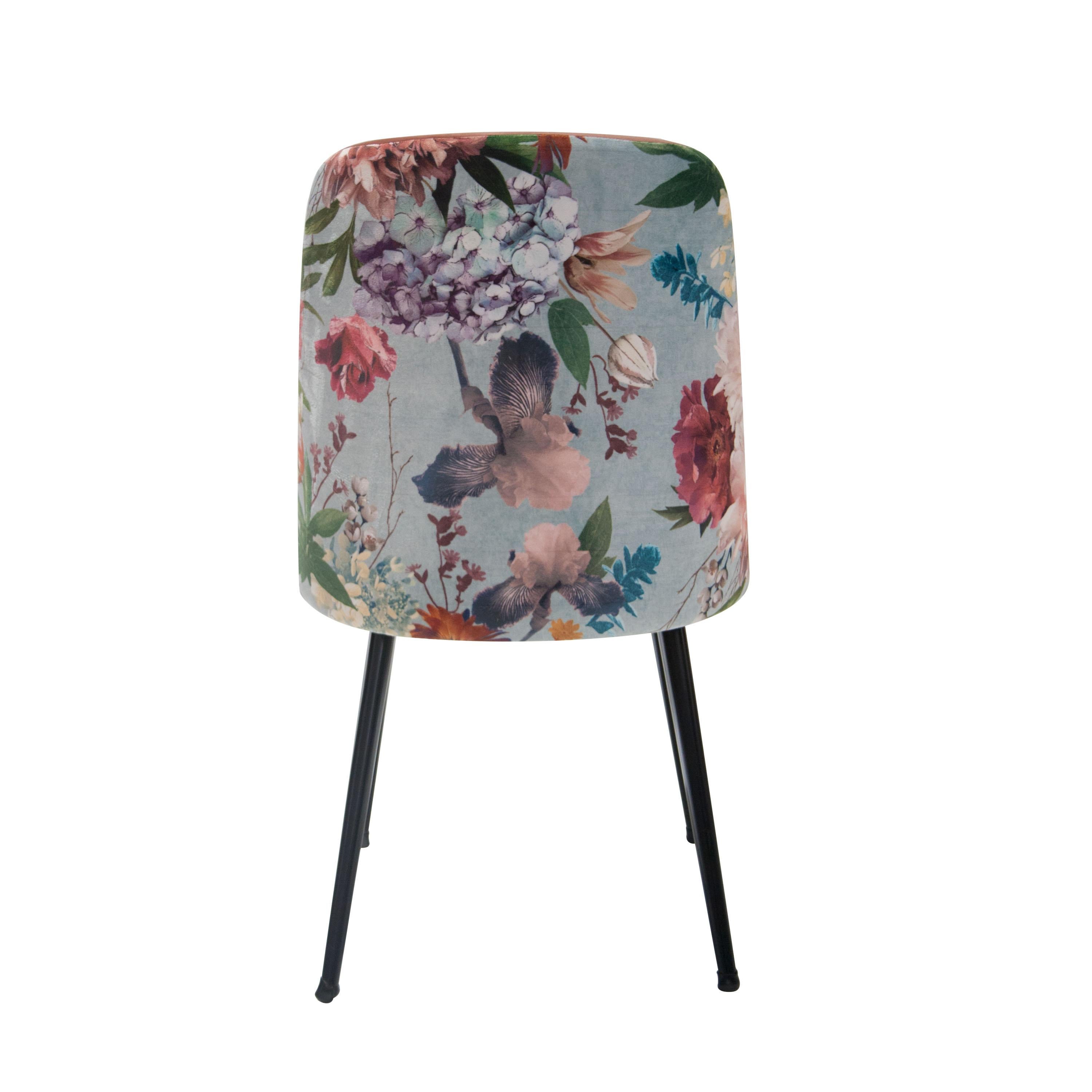 Italian set of 4 chairs with back and seat upholstered in old pink velvet and the back with flowers print. Solid wooden structure with black lacquered metallic conical legs.