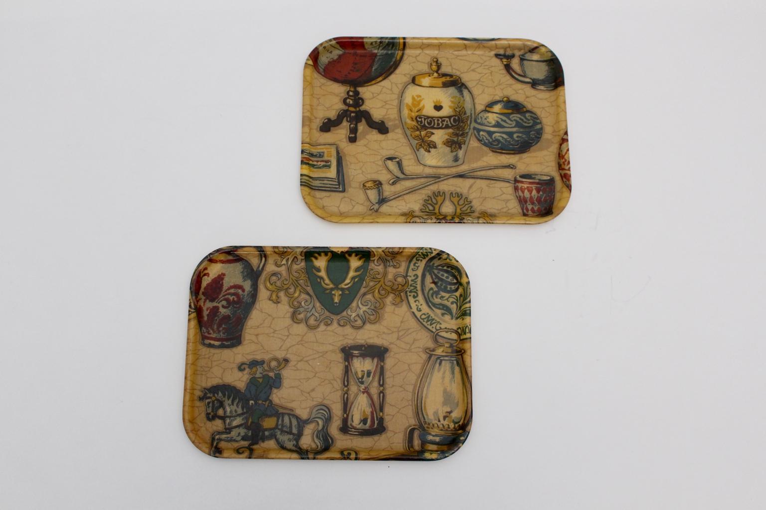 This set of serving trays are printed with multicolored various motifs. very good vintage condition.
Both platters have the same approx. measures:
Length: 35.5 cm
Width: 26.5 cm
Height: 1.8 cm.