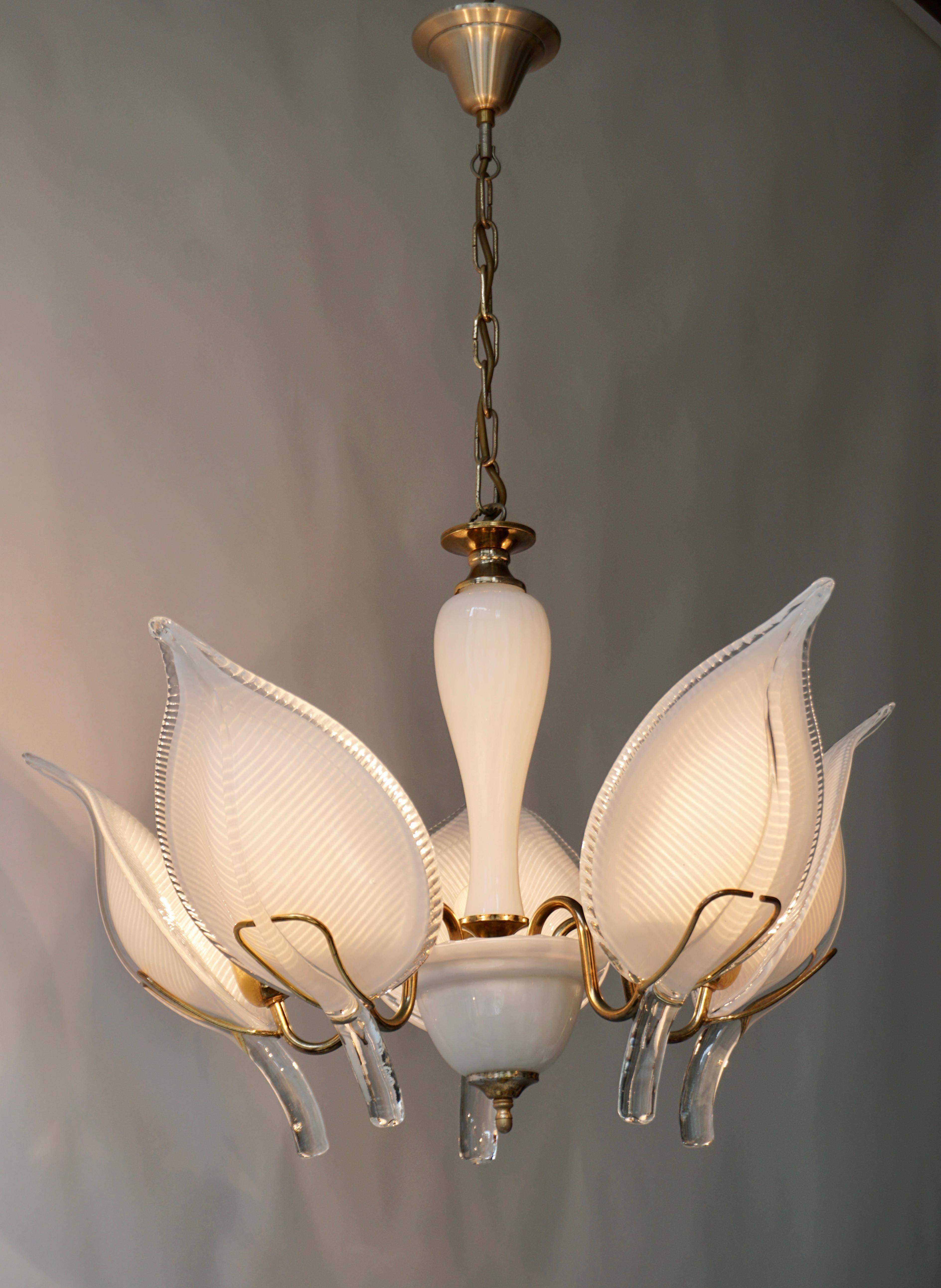 Mid-Century Modern Murano 5 leaf chandelier by Franco Luce. 

Great and wonderfully precious Murano chandelier in handblown glass leaves by the famous master designer Franco Luce. 
The light requires five single E27 screw fit lightbulbs (60Watt