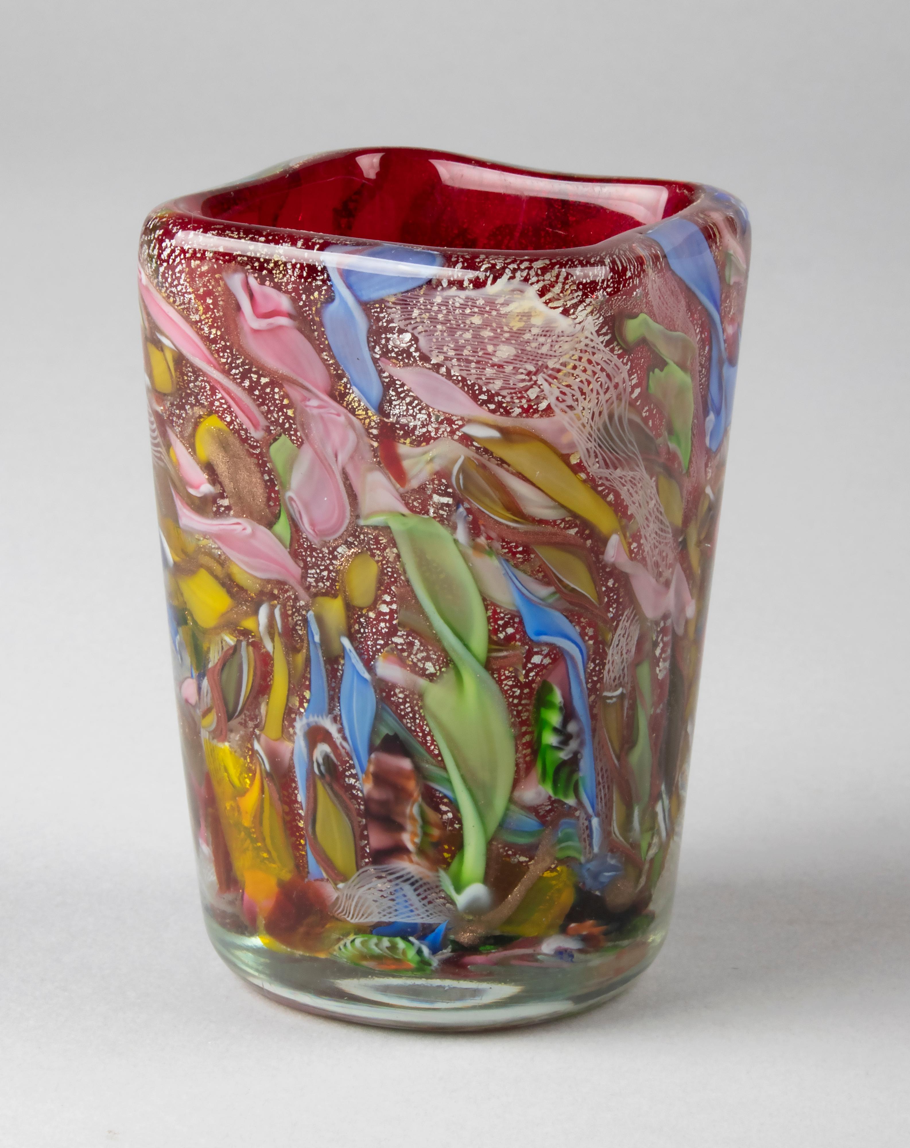 Mid 20th century Italian art glass vase attributed to Anzolo Fuga (1914-1998) Arte Vetreria Muranese A VE M. It is a squared tapering vase in the tutti frutti decor with multi colored fused glass pieces and silver flecks. Not signed, in good