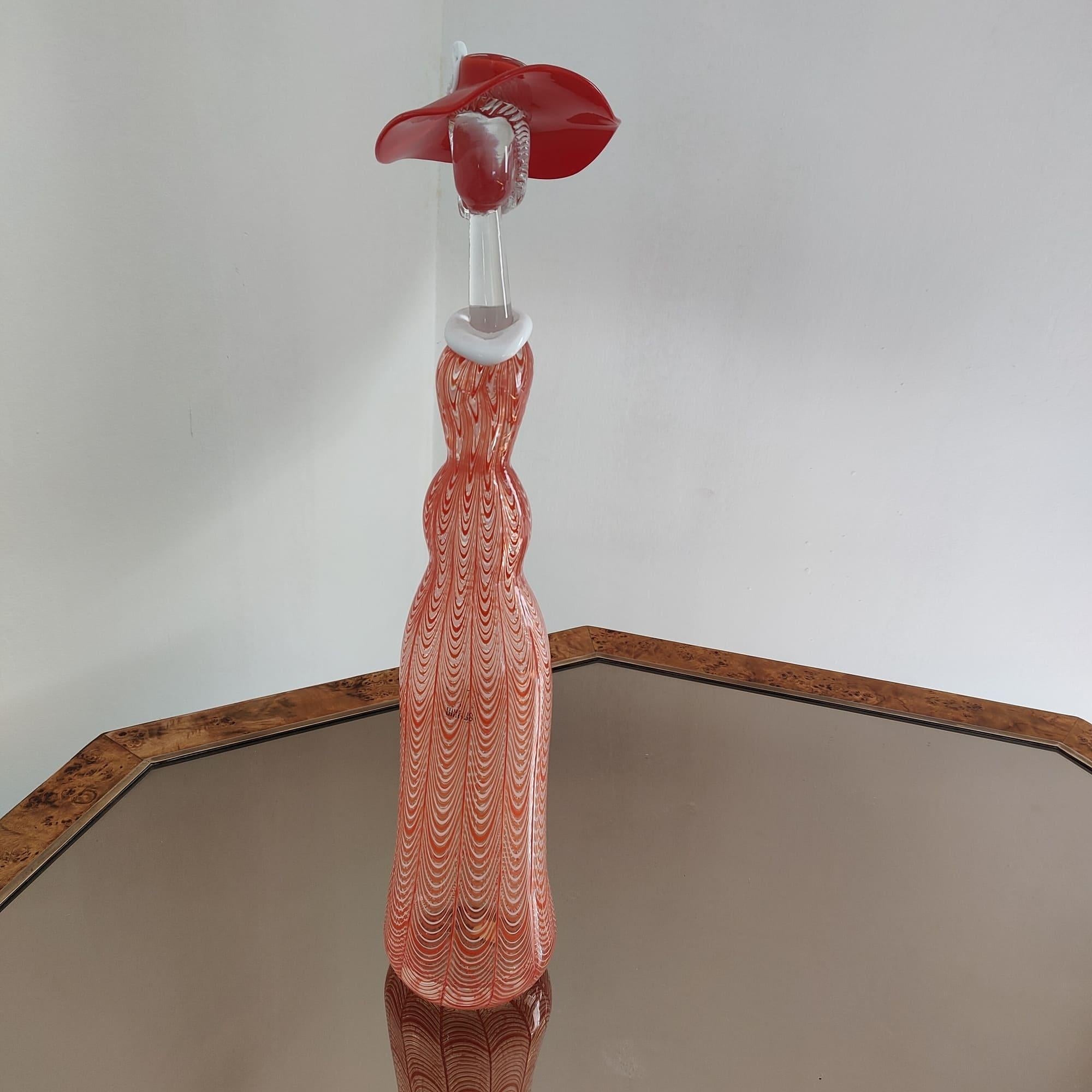 Mid-century modern murano art glass woman sculpture by Licio Zanetti Italy 1970

This stunning Murano glass sculpture by Licio Zanetti, crafted in the 1970s, beautifully depicts a graceful female figure. An authentic Italian work of art, this piece