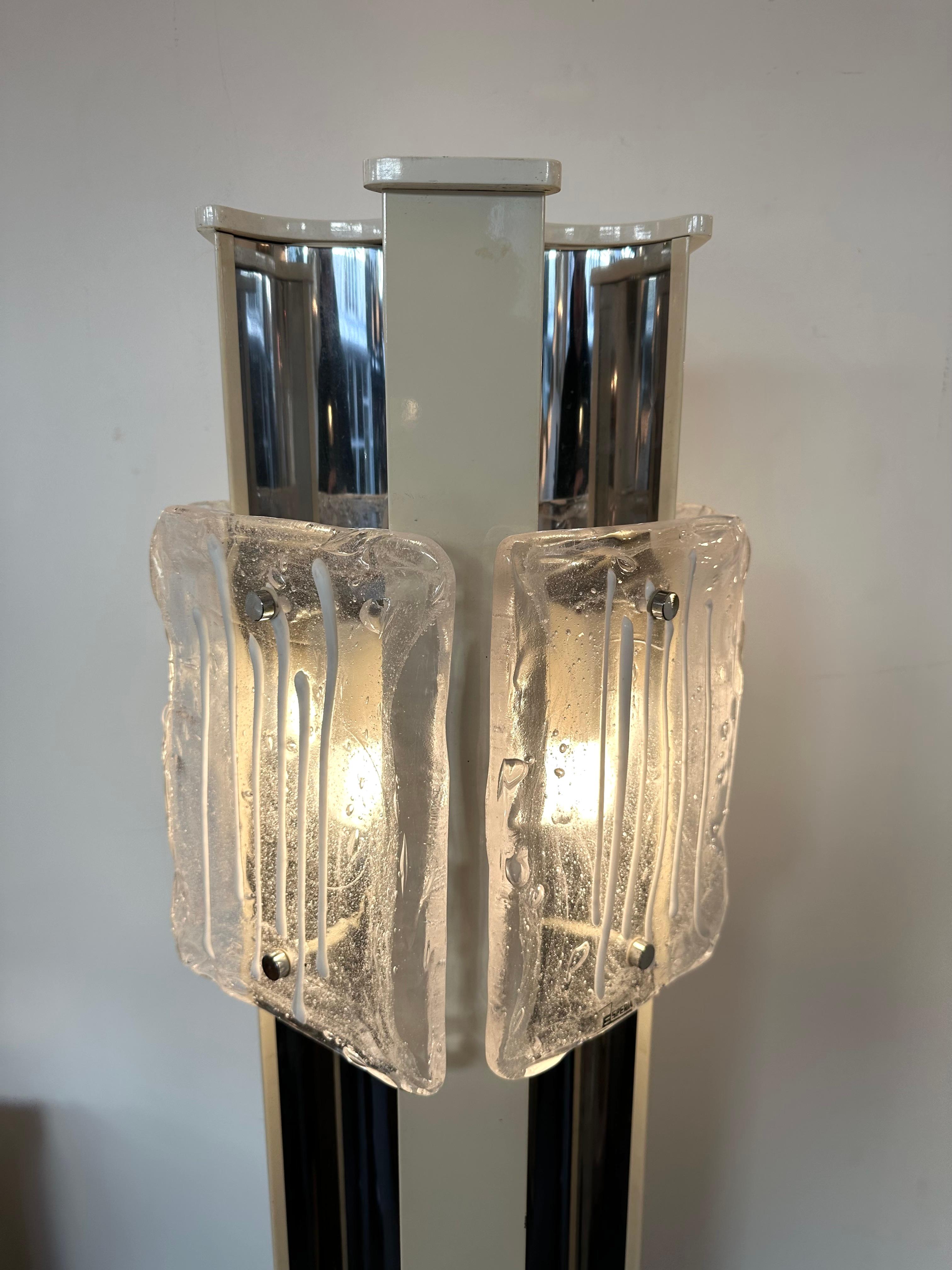 Mid-Century Modern Space Age Floor lamp design by Angelo Brotto for the Italian design manufacture Esperia. Blade of Murano glass, metal chrome and white cream metal lacquered base. Famous editor manufacture like Venini, Vistosi, La Murrina, Seguso,