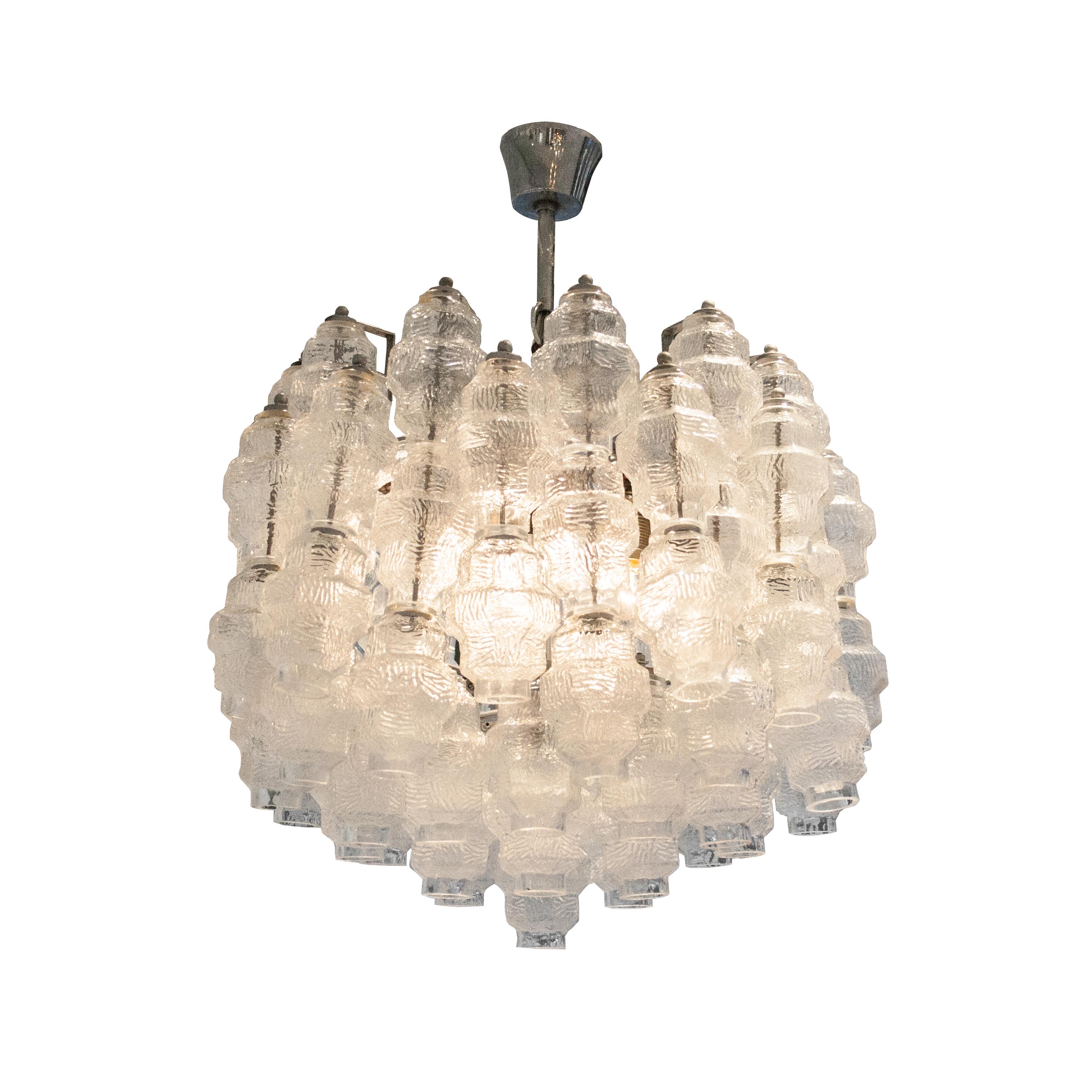 Murano glass chandelier. It is made up of a chromed steel structure that supports 80 pieces of hand-blown Murano glass with 3 light points.