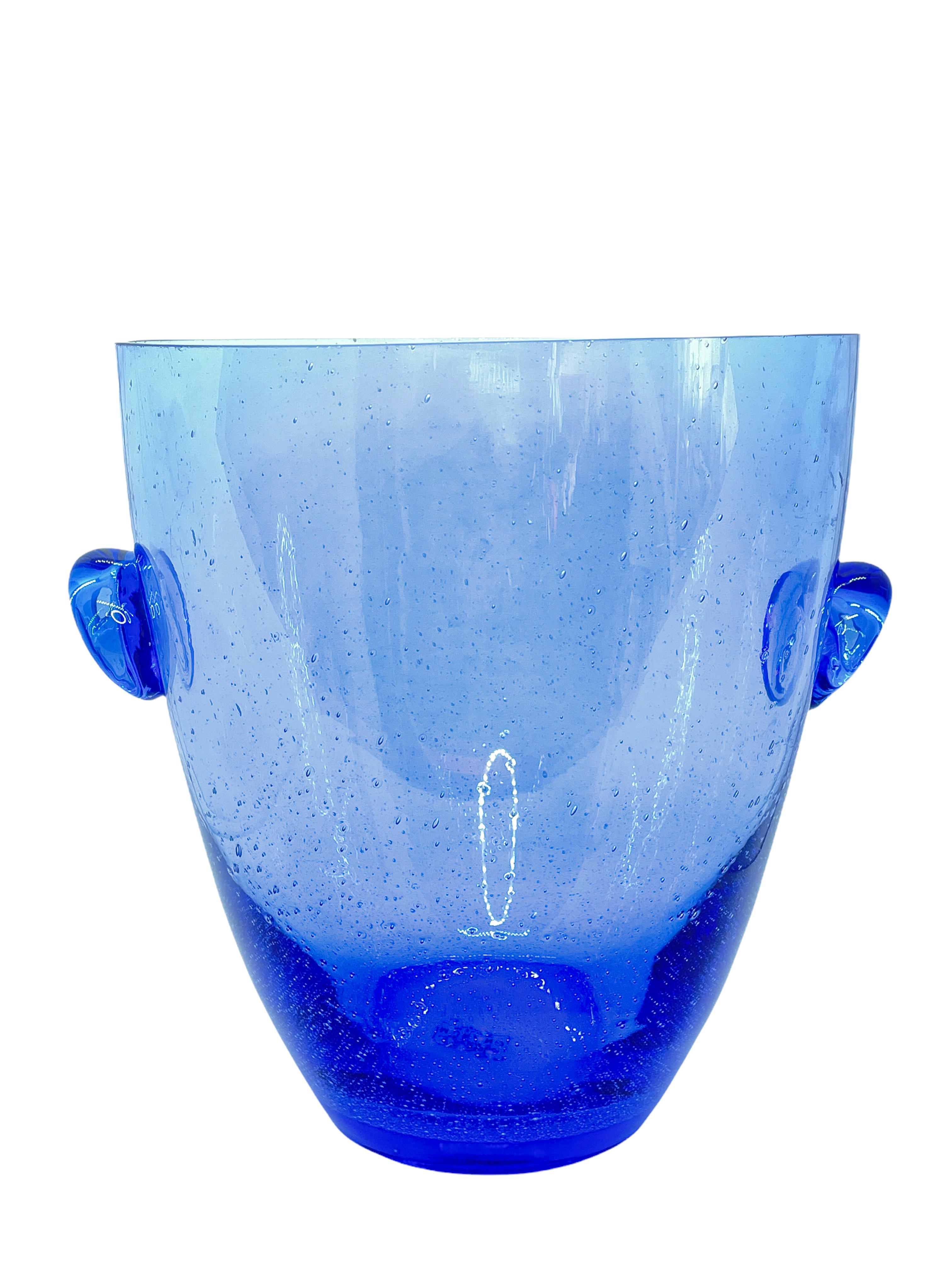 A nice barware item from Murano Italy, made in the 1980s. An all original Glass item to display in your bar or just on a cupboard with a bottle of wine or champagne. Mouthblown glass, with small little air bubbles inside and little scratches from