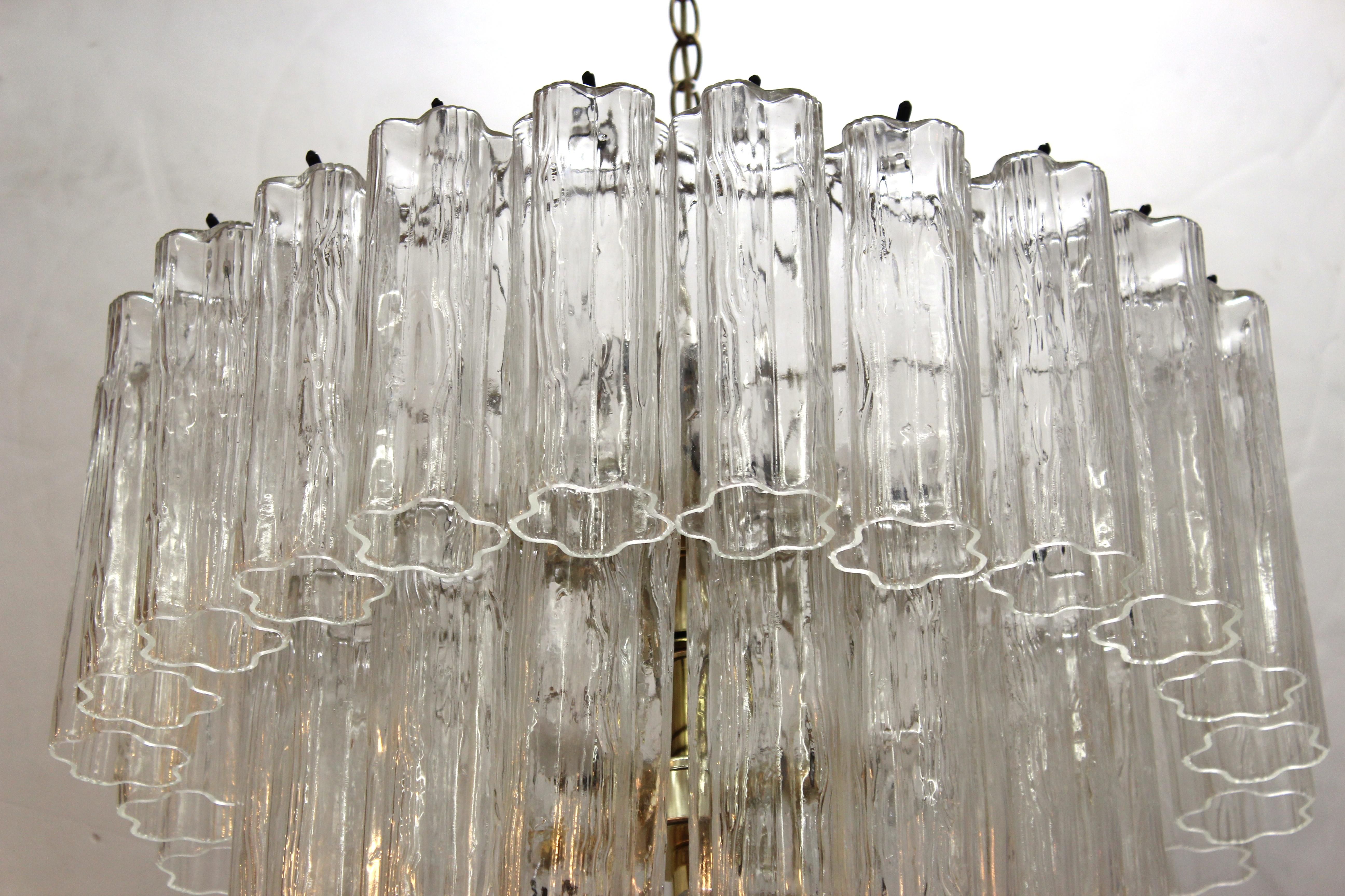 Mid-Century Modern Murano glass chandelier with three tiers. The piece was manufactured in Italy and is in great vintage condition.