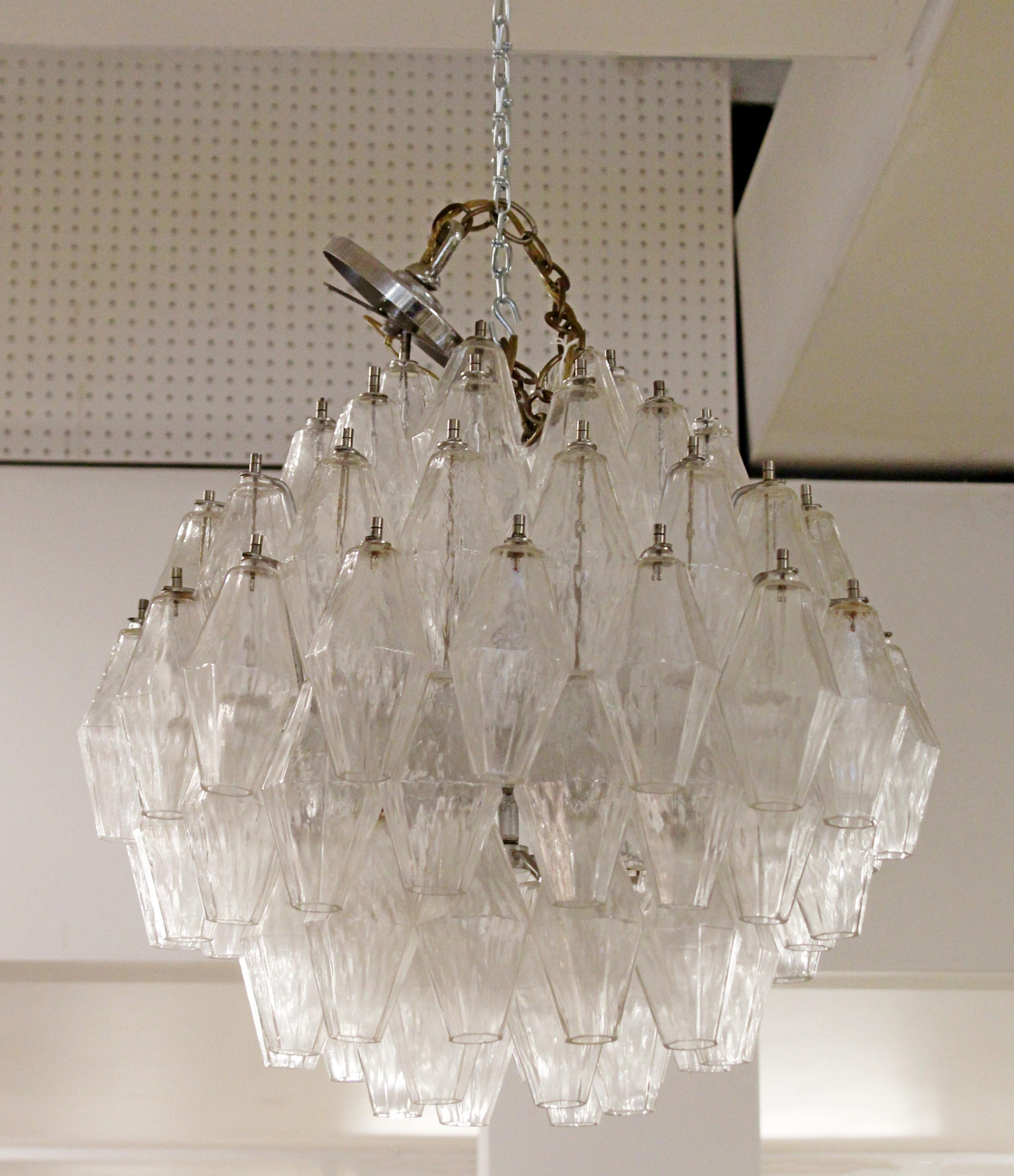 For your consideration is a rare and fabulous, polyhedral chandelier, made of clear Murano glass, by Venini, circa 1960s. In excellent condition. The dimensions are 20