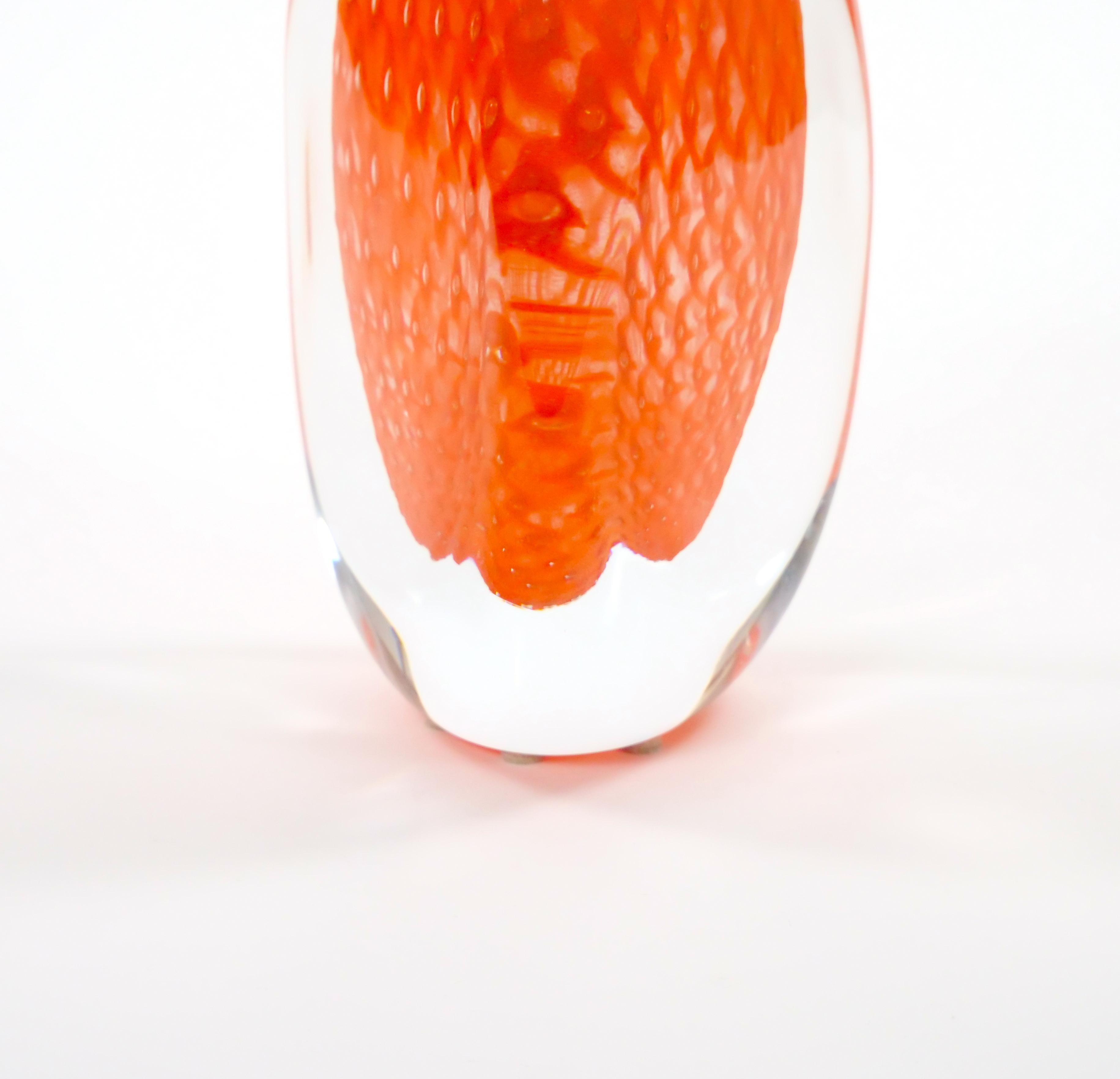 This striking mid-century modern Murano glass vase, handmade and mouth-blown by renowned Italian artisan Giampaolo, is a true work of art from late 20th-century Venice. The vase showcases a bold geometric shape in a deep orange hue, enhanced by gold