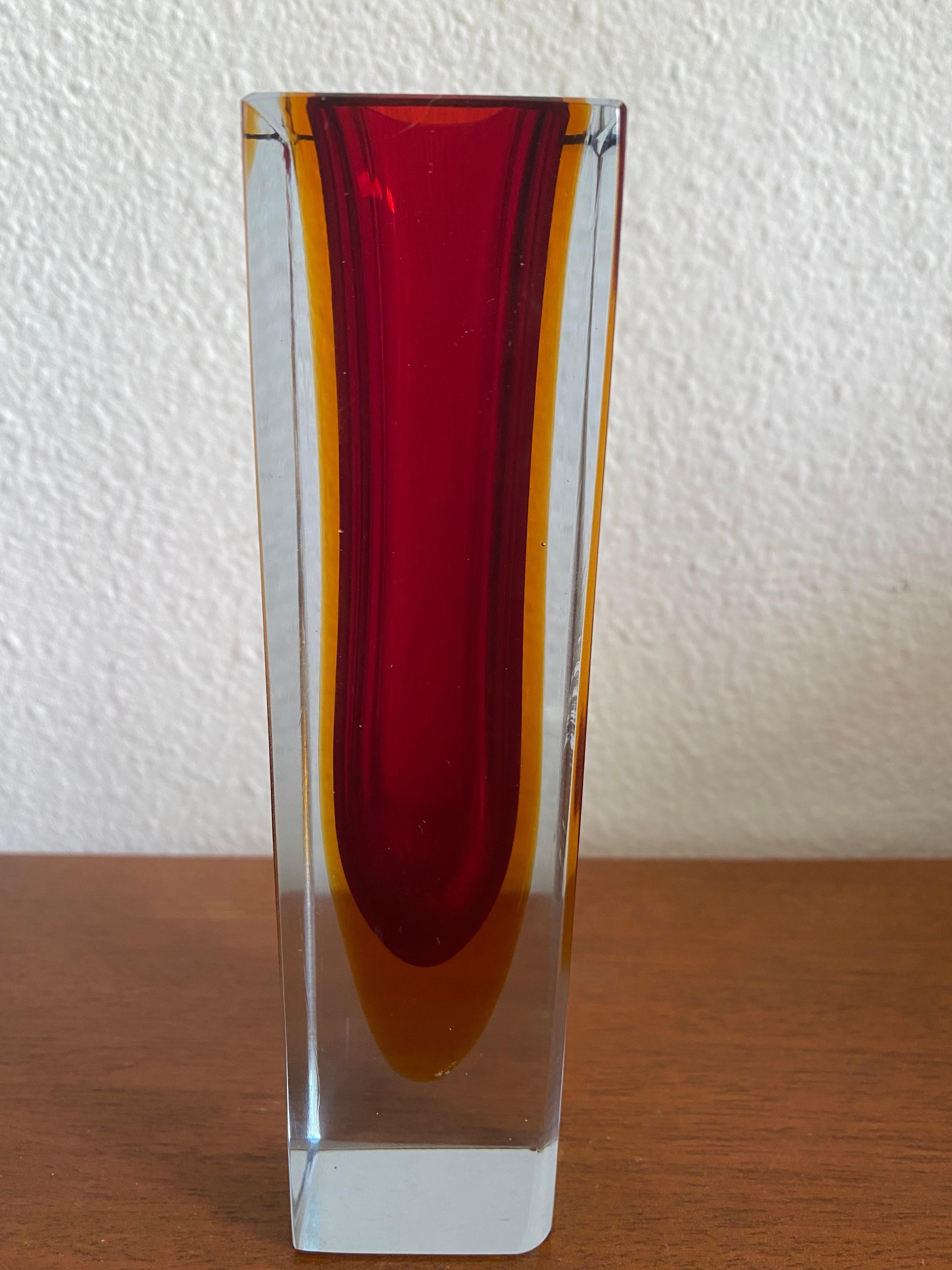 Beautiful red and orange Mid-Century Modern Italian Murano glass vase. Made using the Sommerso (submerged) glass technique.