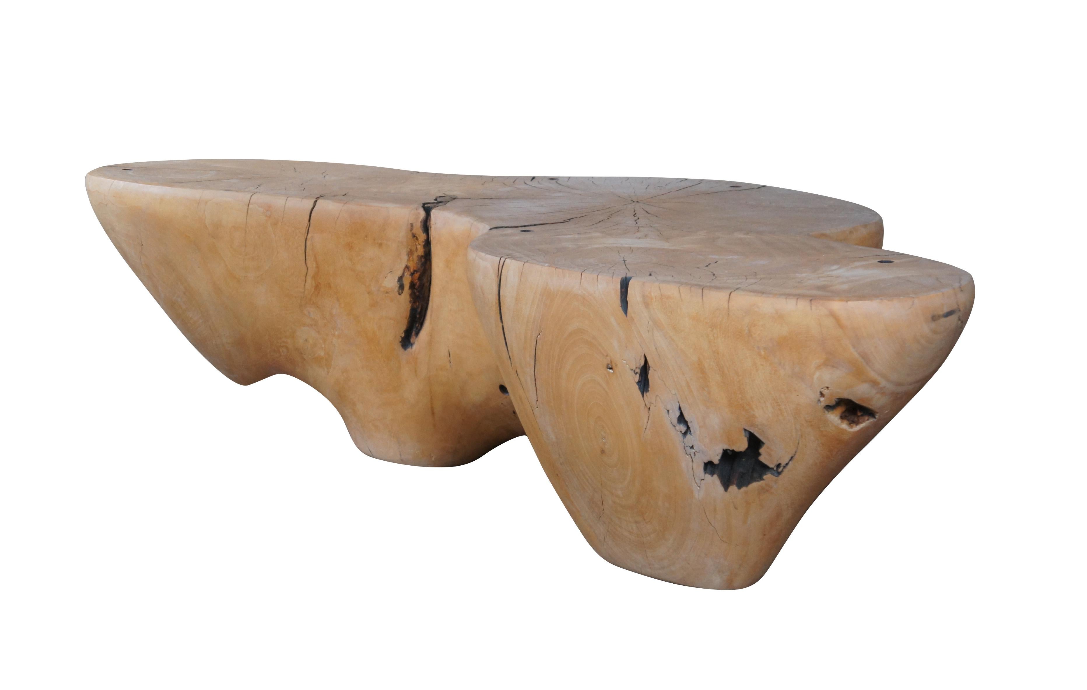 A natural Ash root table, circa 1960s. Features a free-form design with a blend of rustic and modern styling. Smoothly finished allowing the woodgrain to show through.