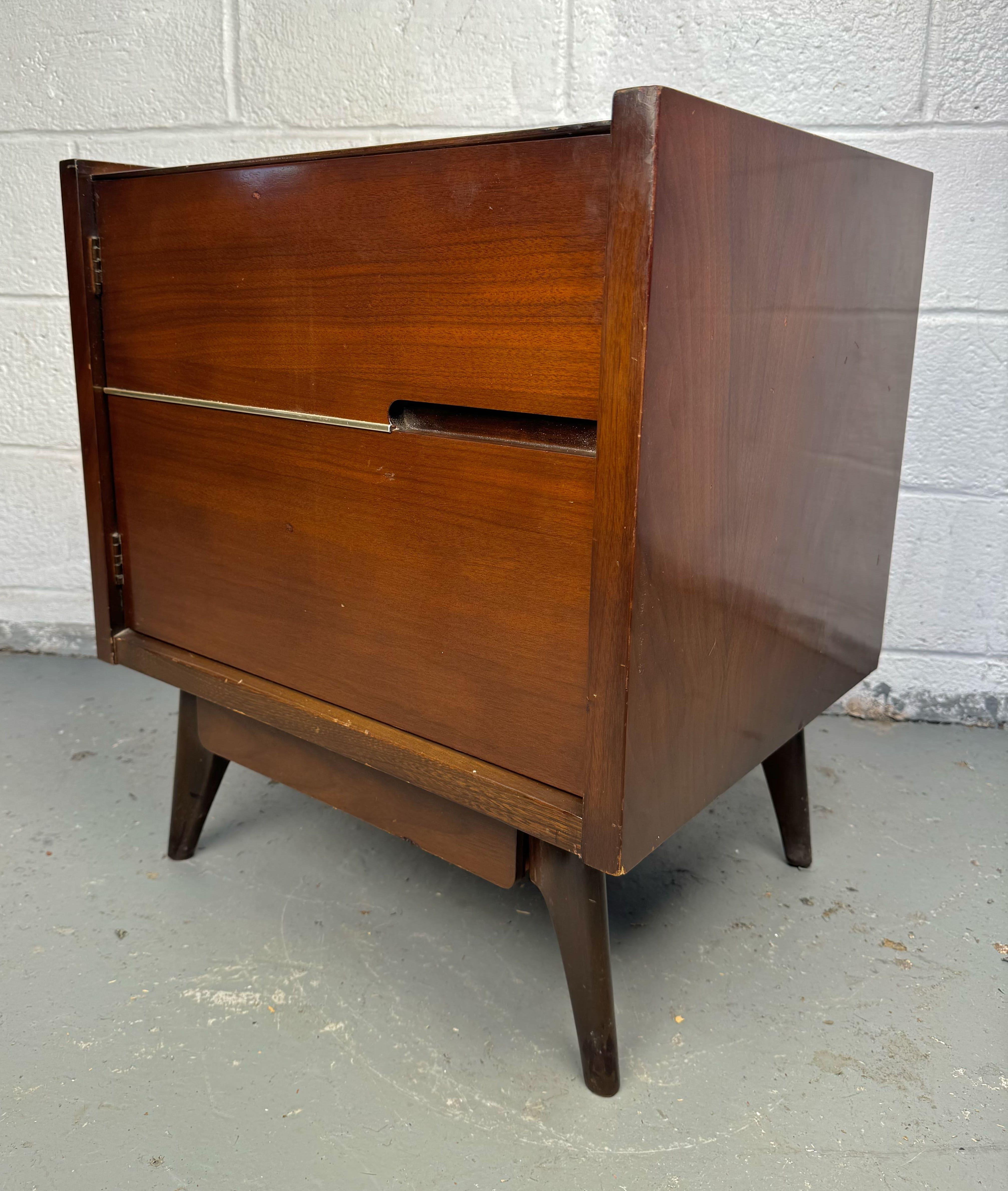 Elevate your bedroom decor with this Hoke Wood Products Nightstand, a perfect blend of elegance and functionality. Crafted from high-quality wood, this nightstand features a warm, natural finish that complements any interior style. Please confirm