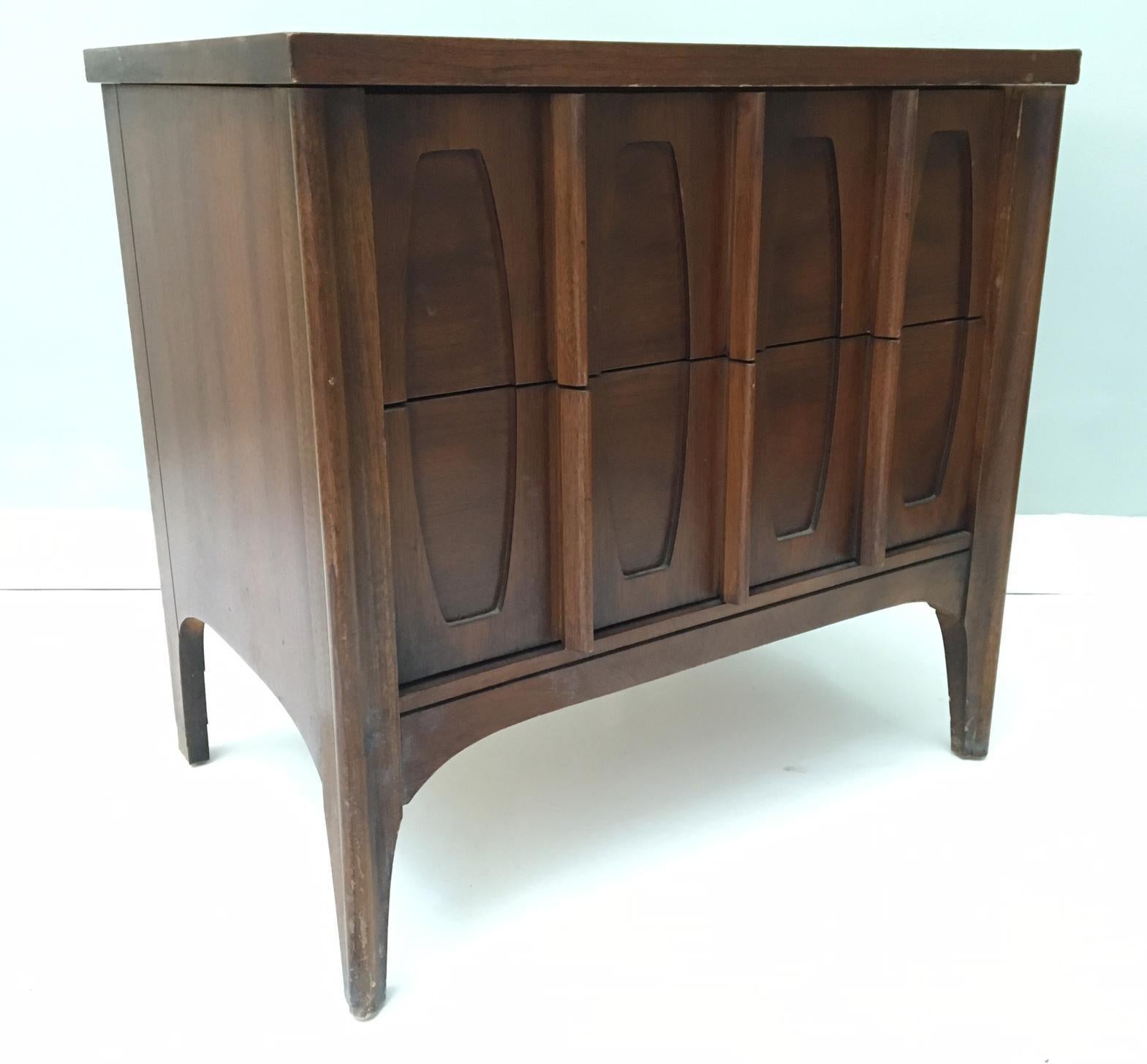 From the Town House collection by Kent Coffey, this nightstand adds the perfect midcentury style to a bedroom, or even as an end table in the living room. Excellent vintage condition with minor abrasions consistent with age.