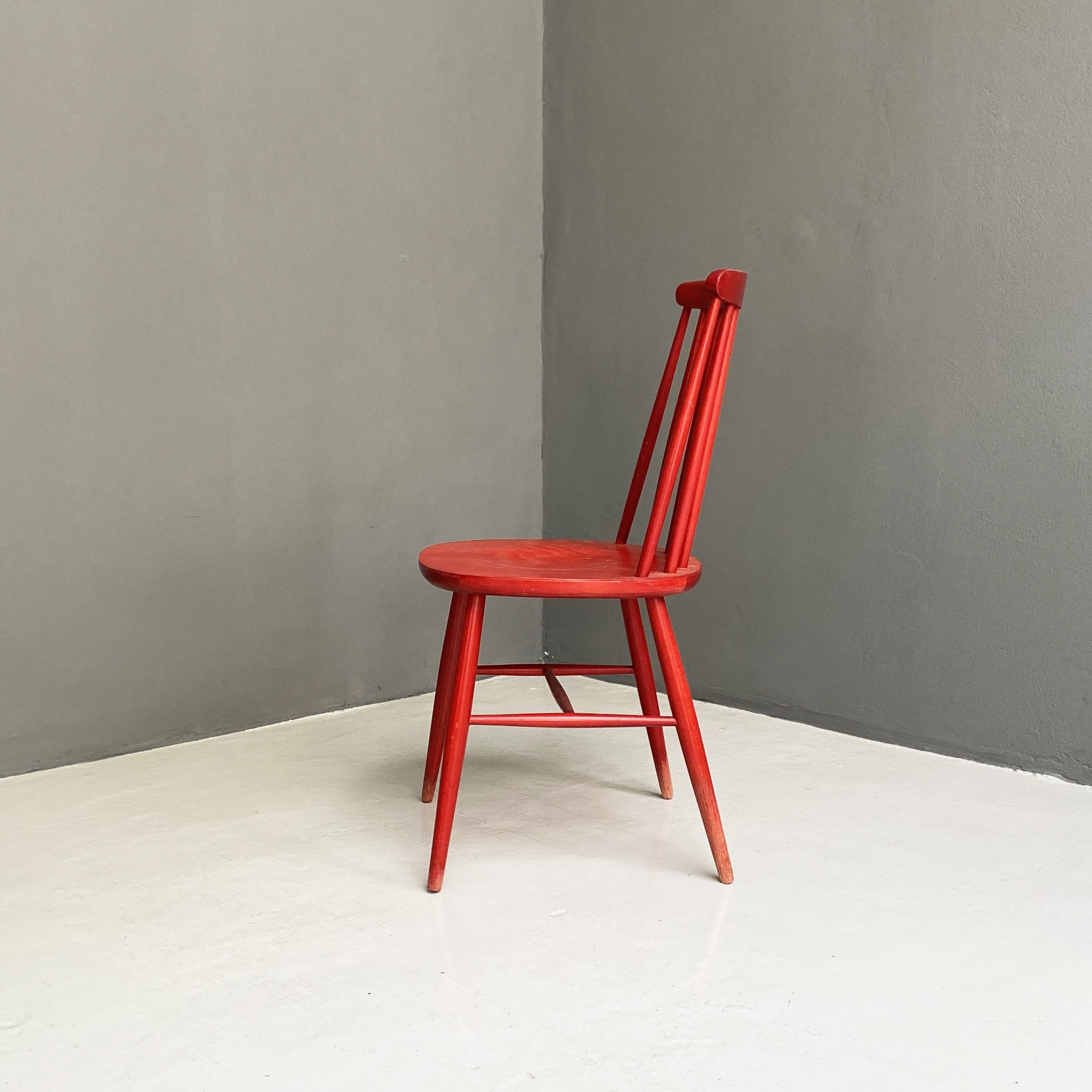 Mid-Century Modern northern Europe Red wooden chair, 1960s

Chair in beech solid wood painted in red with slat backrest.
1960s
Very Good condition, paint skipped on some points.
This chair  is perfect for a kitchen table or a desk, the confort of