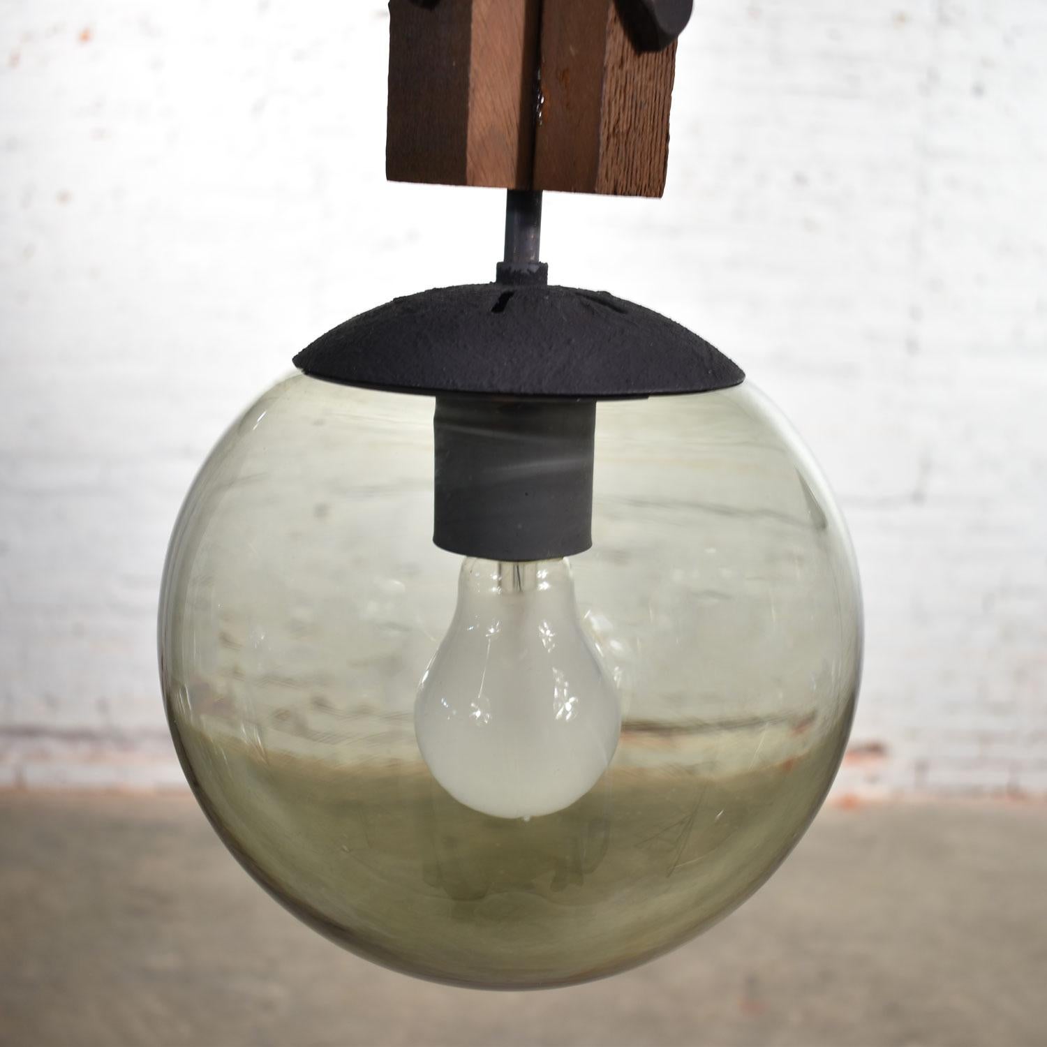 Metal Mid-Century Modern NOS Wood and Smoked Glass Globe Pendant Light Black Chain For Sale