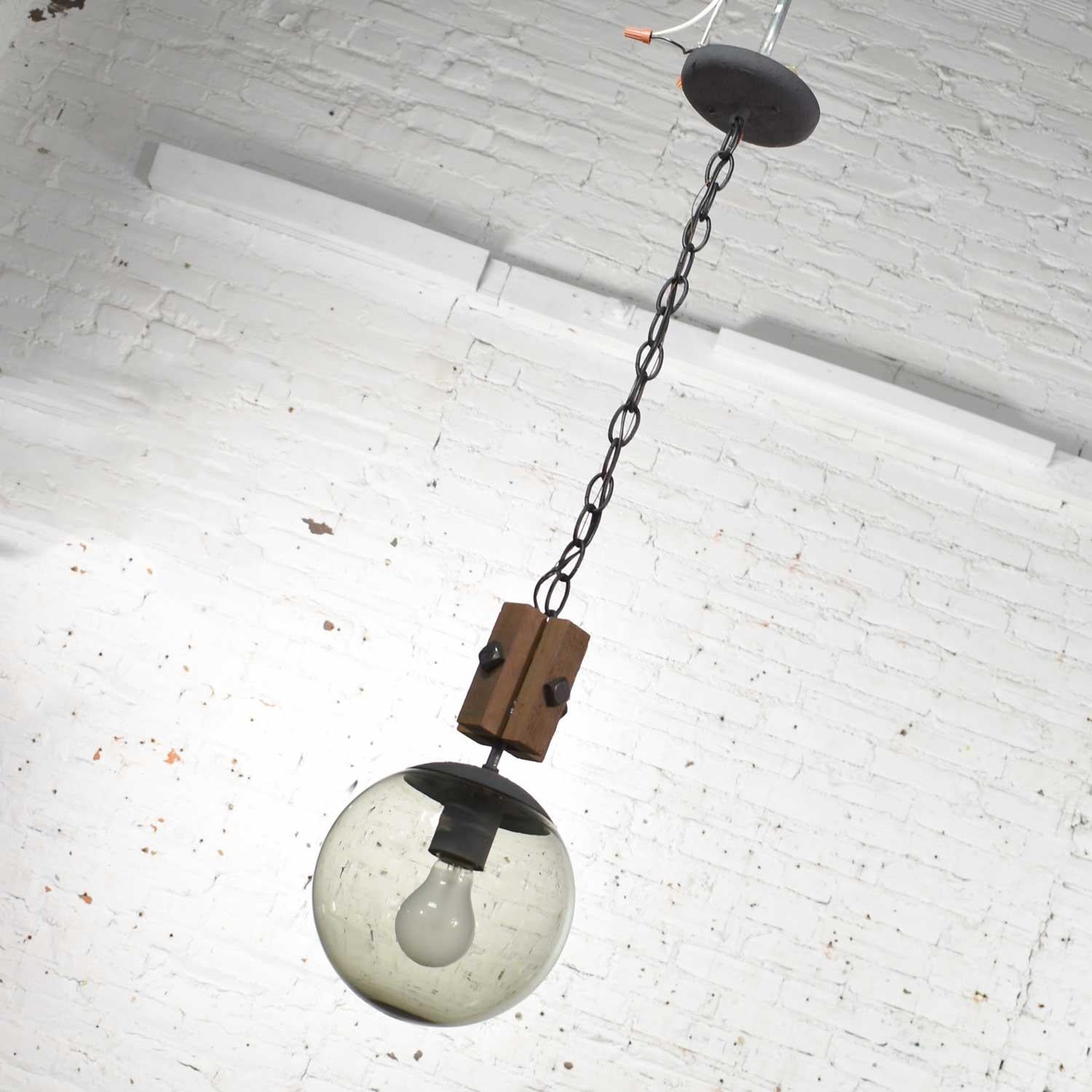 20th Century Mid-Century Modern NOS Wood and Smoked Glass Globe Pendant Light Black Chain For Sale