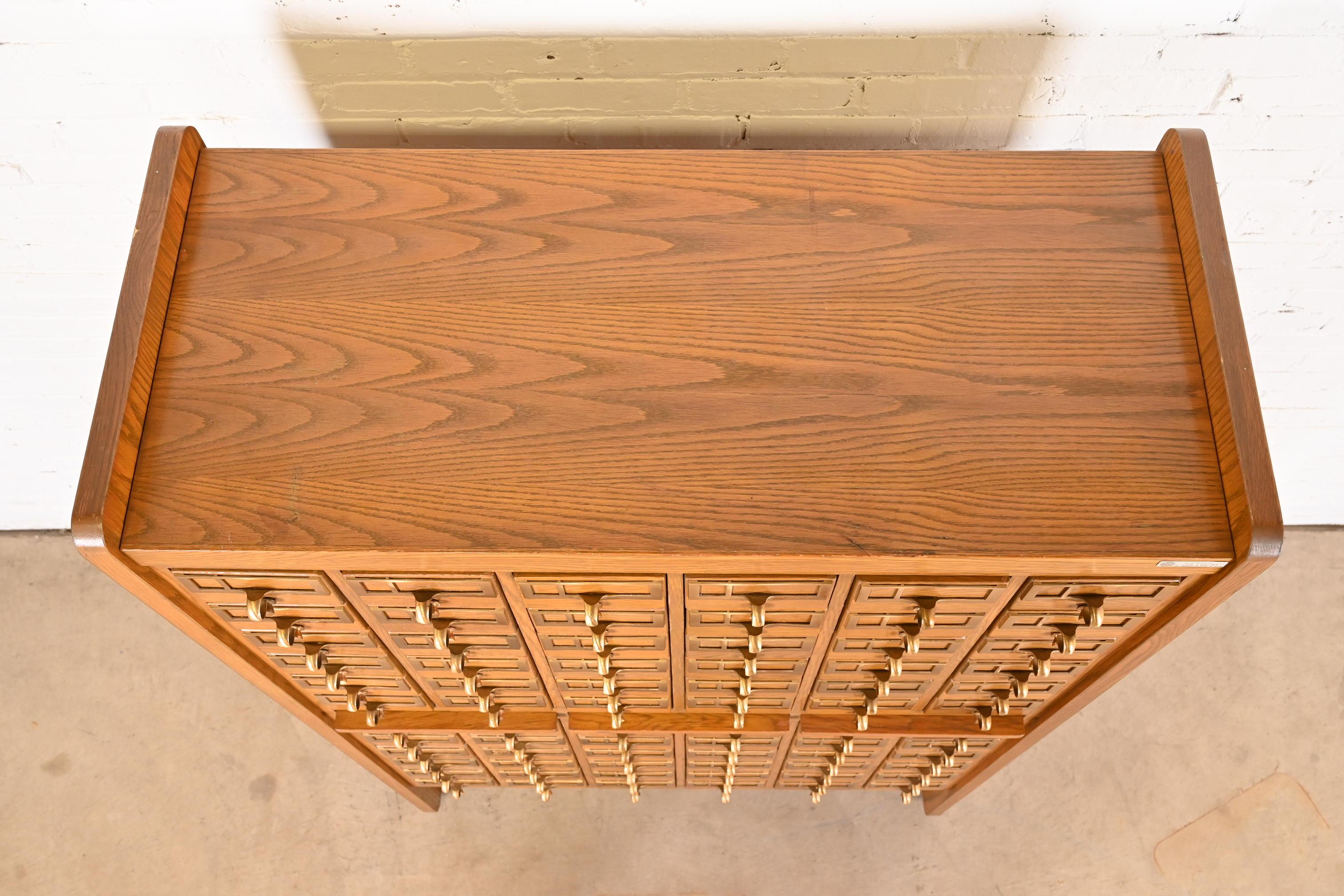 Mid-Century Modern Oak 72-Drawer Library Card Catalog Cabinet, Circa 1960s In Good Condition In South Bend, IN