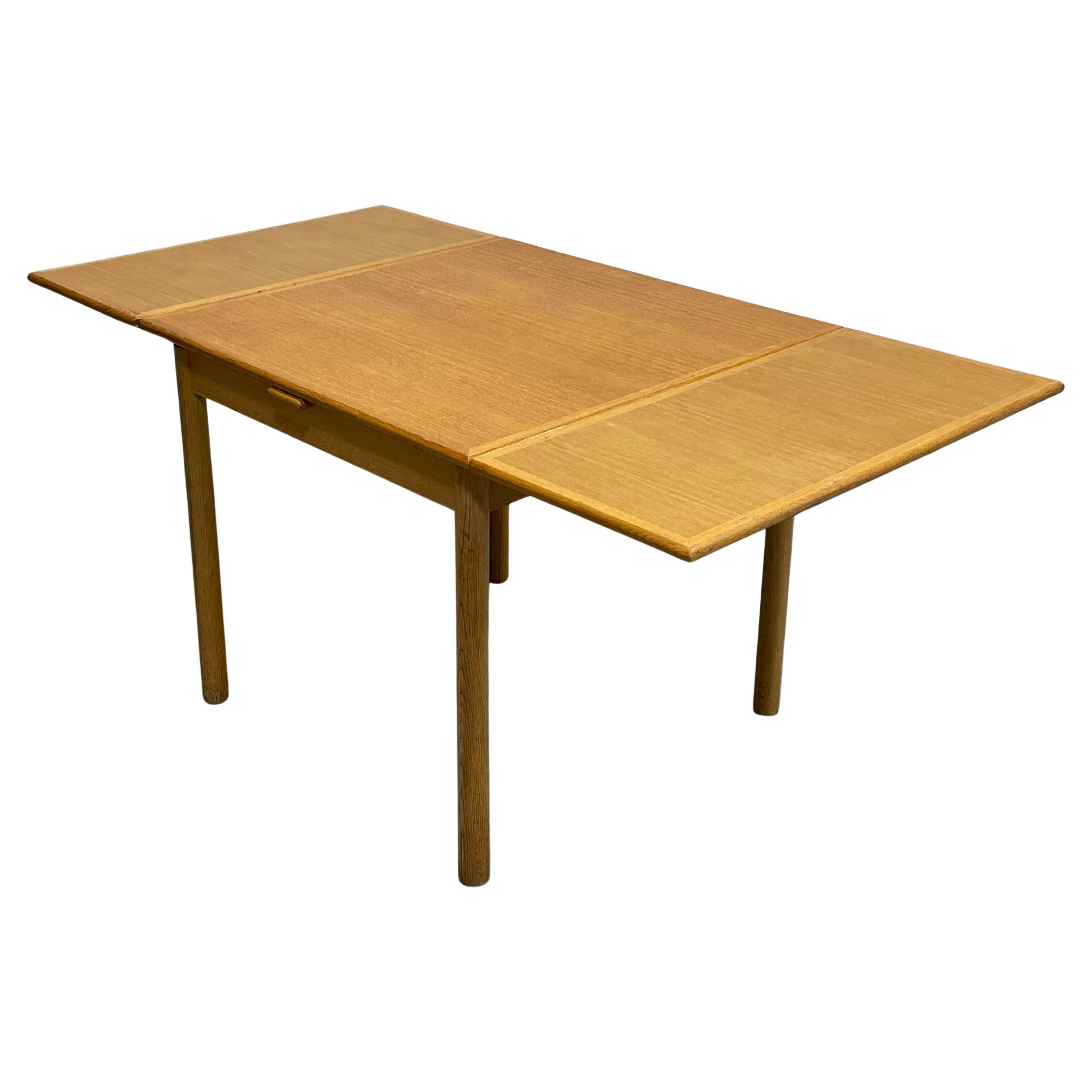 Mid Century Modern Oak DANISH DINING TABLE hidden leaves, c. 1960s