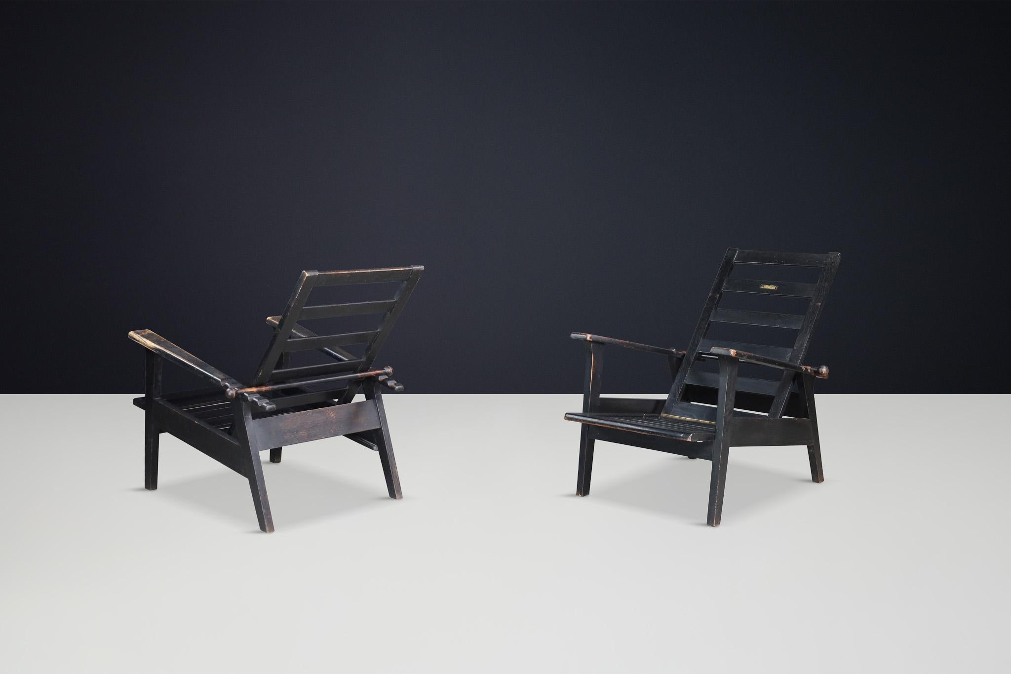 Mid-Century Modern Oak Lounge Chairs by Antonín Heythum, Prague, 1930s

This rare pair of oak lounge chairs was designed by the renowned Czech designer Antonín Heythum in the 1930s. They are characterized by bold, architectural lines and solid