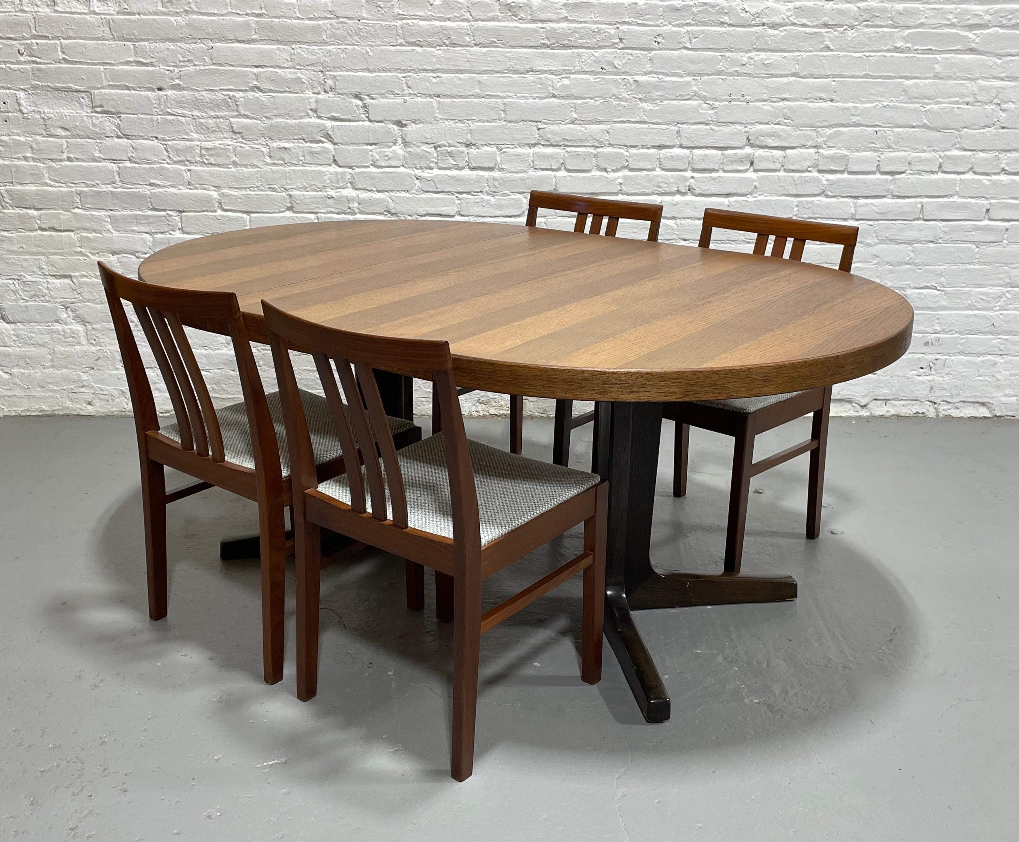 Mid Century MODERN OAK ROUND to OVAL Dining Table, Made in Denmark. c. 1960s In Good Condition For Sale In Weehawken, NJ