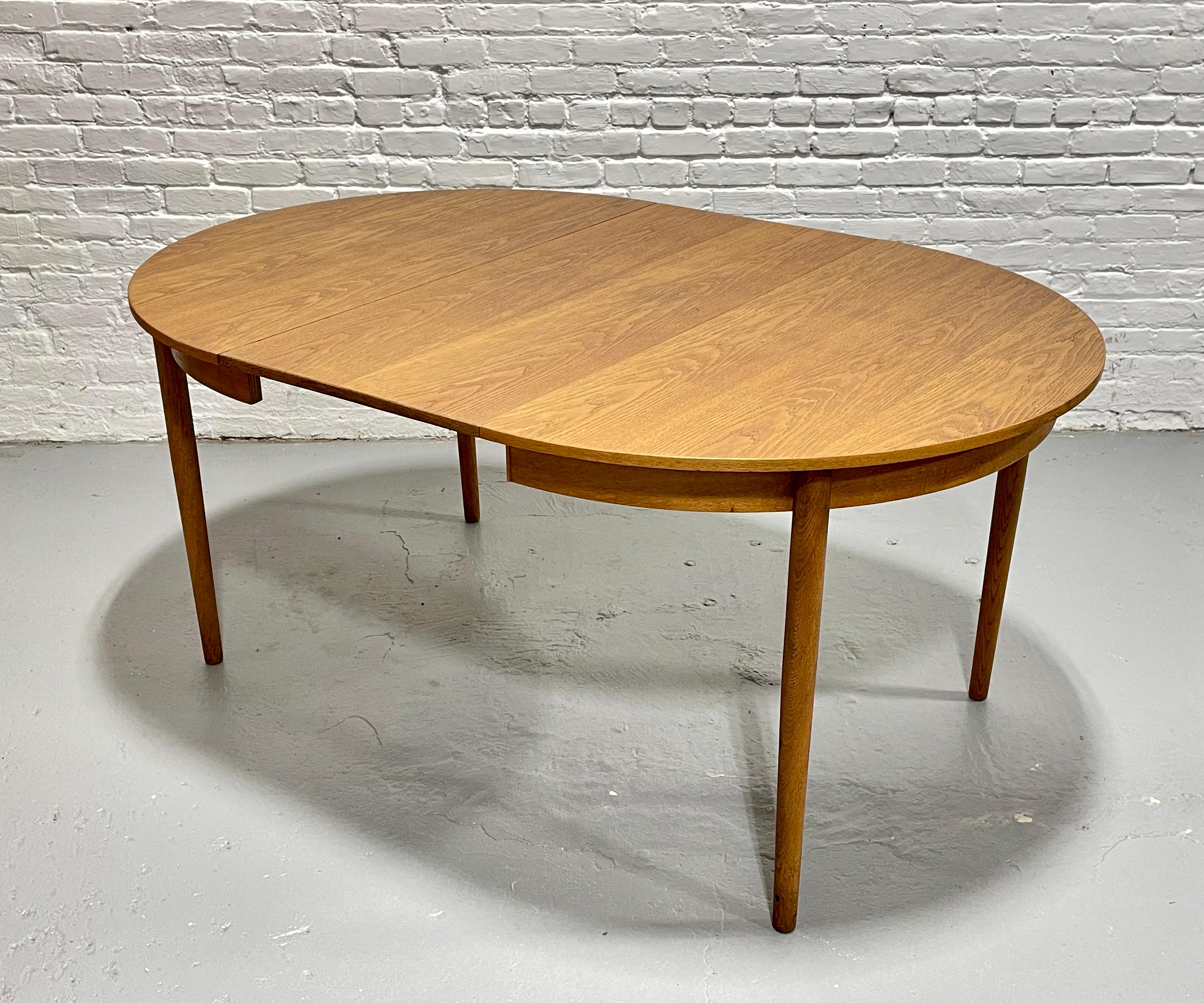 Mid-20th Century Mid Century MODERN Oak ROUND to OVAL Dining Table, Made in Denmark, c. 1960's
