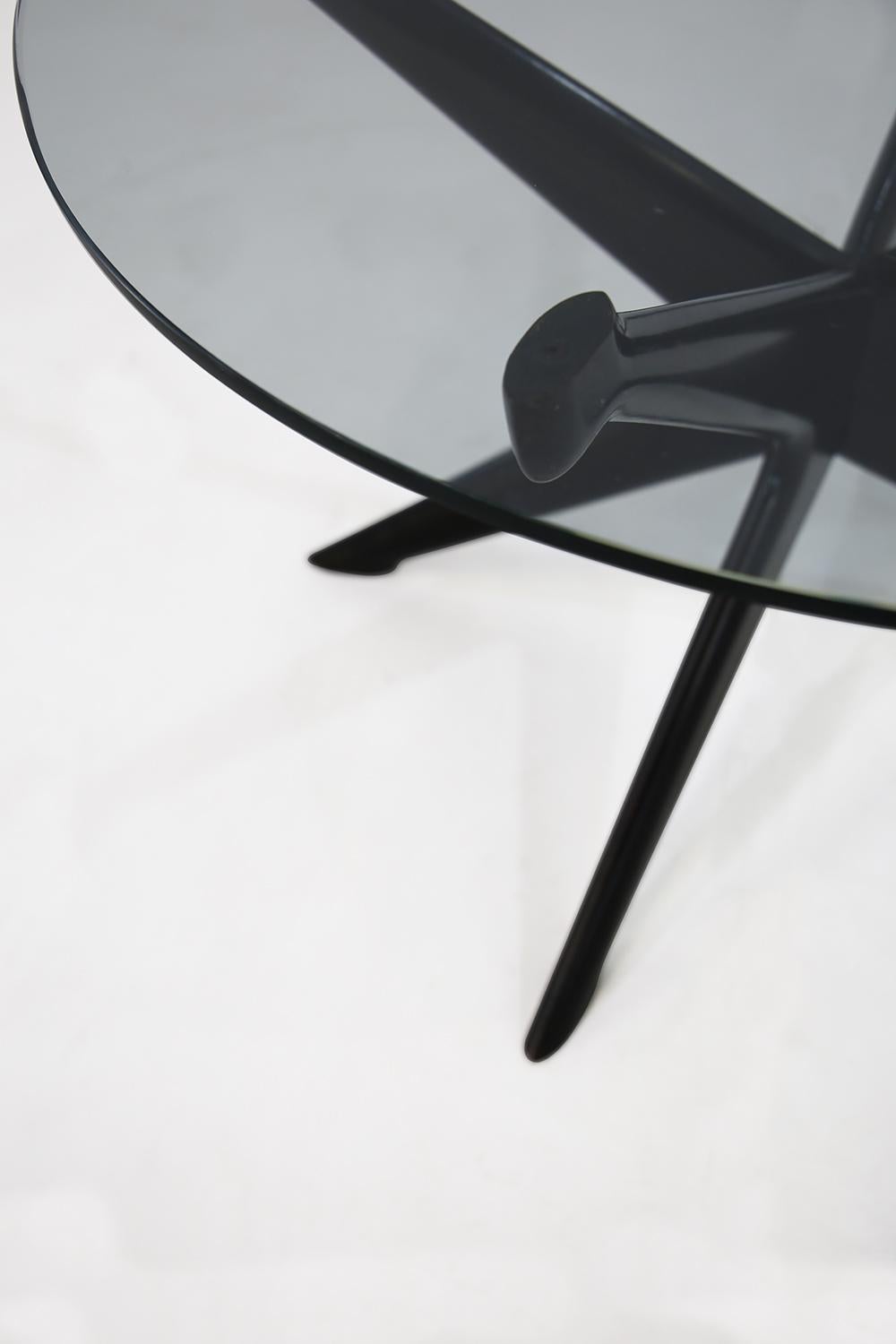 Occasional table designed by Ico Parisi 
Manufactured Fratelli Rizzi Intimiano Italy
the table can be used as a coffee table or as a side table
Good condition, in ebonized wood
glass in good condition.
beautiful example of 1950s Italian