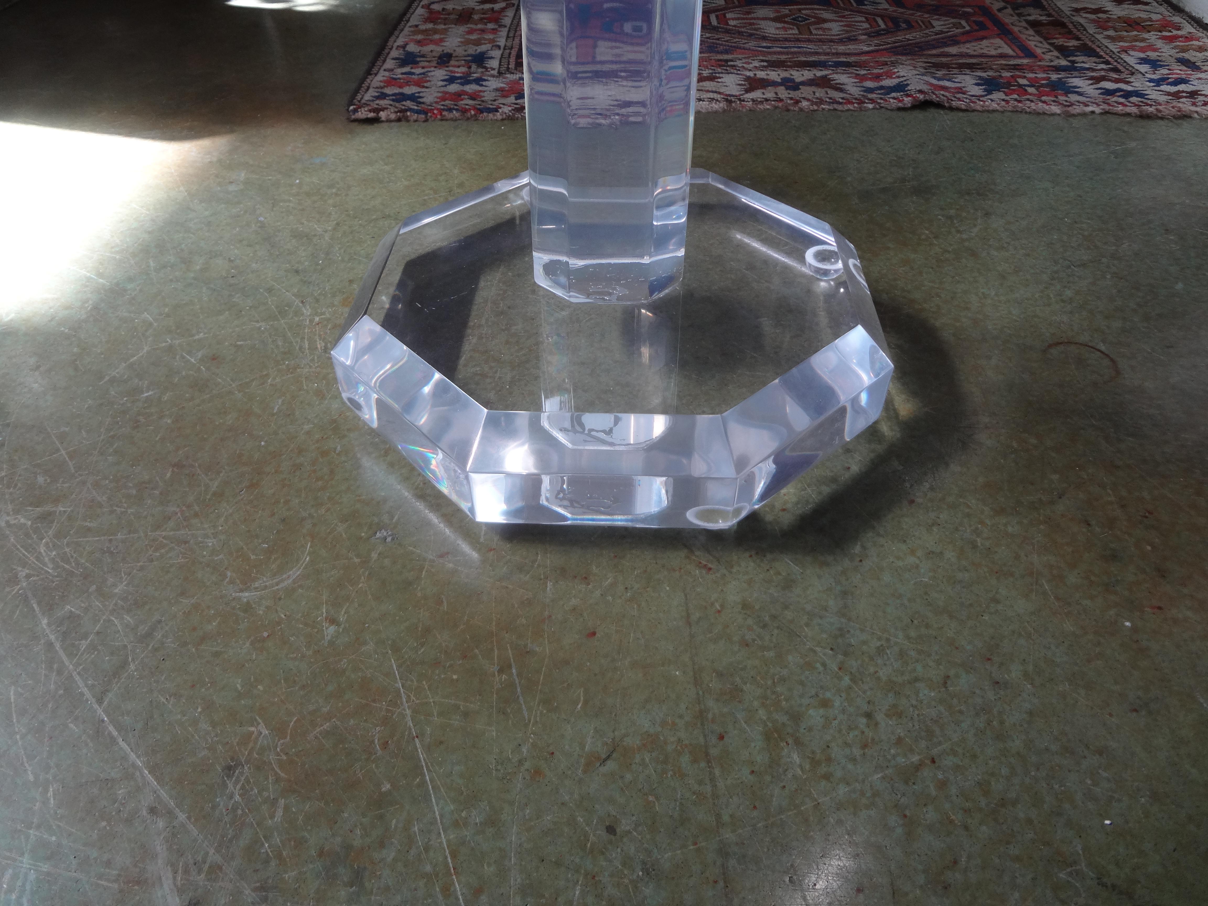 Strong Mid-Century Modern octagonal acrylic or Lucite table, side table, guéridon or drinks table. This vintage table features thick acrylic with a beautiful bevel.
Perfect for between chairs or wherever a side table is needed.