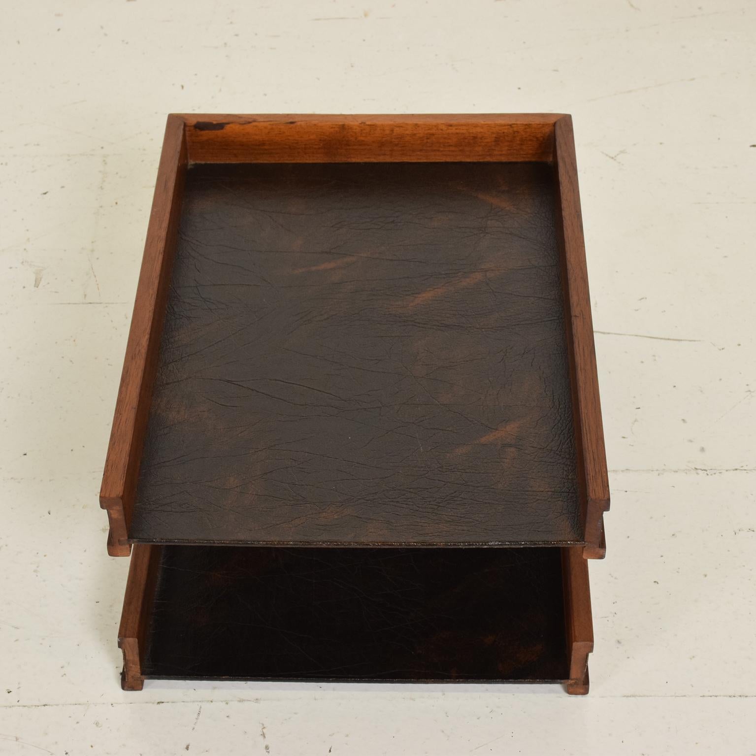 For your consideration, a Mid-Century Modern office tray accessories, wood and faux leather.

Unmarked, no information on the maker or designer. The USA, circa 1960s.

Constructed with wood, brown faux leather, and iron rods. 

Dimensions: 6