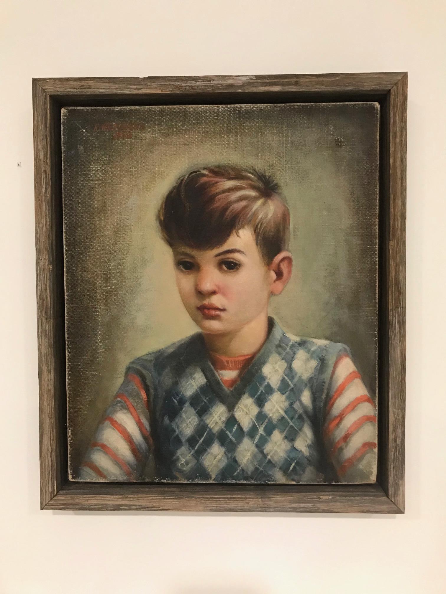 Vintage portrait of a young boy wearing a striped red shirt with blue argyle sweater. Oil on canvas painting by artist Robert Rukavina (1914-1977), who lived in the United States and is known for his realist figure and portrait artwork. There is a