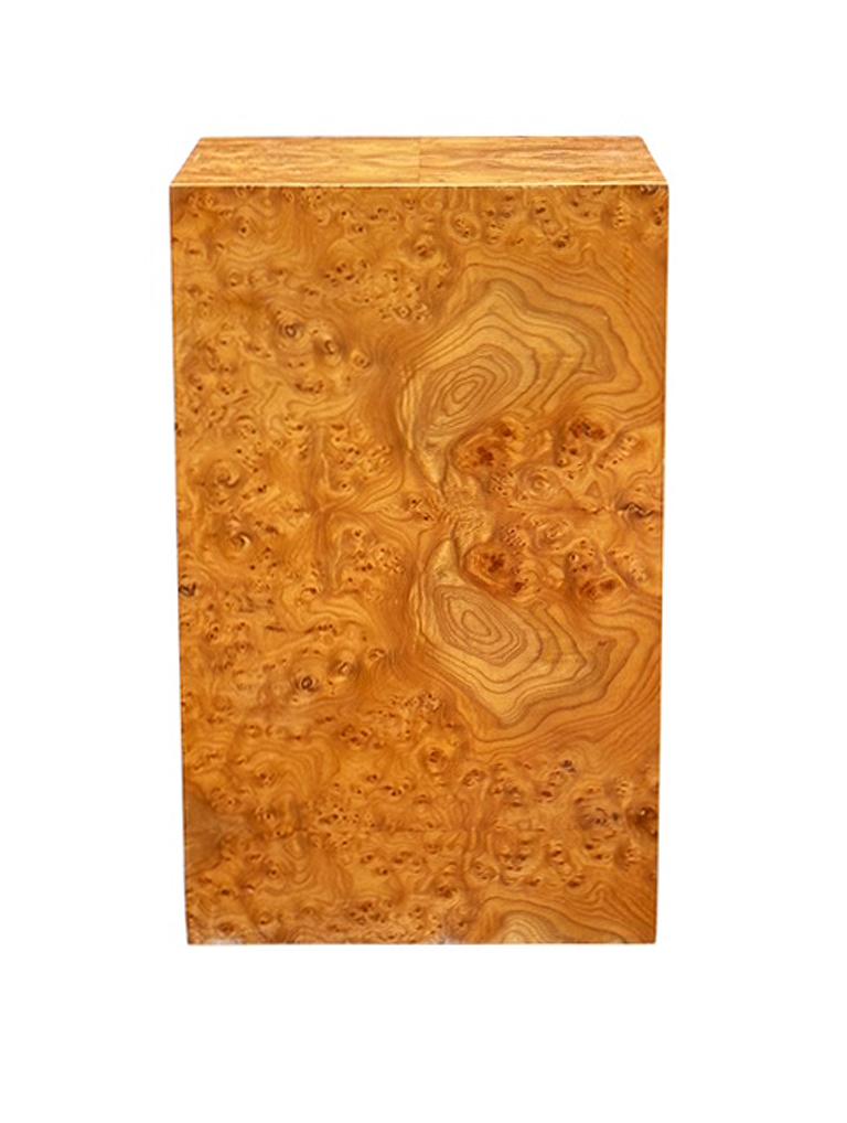 A gorgeous classic pedestal after Milo Baughman. It features heavy wood construction with beautiful book matched olive burl. Clean and ready to use condition.
