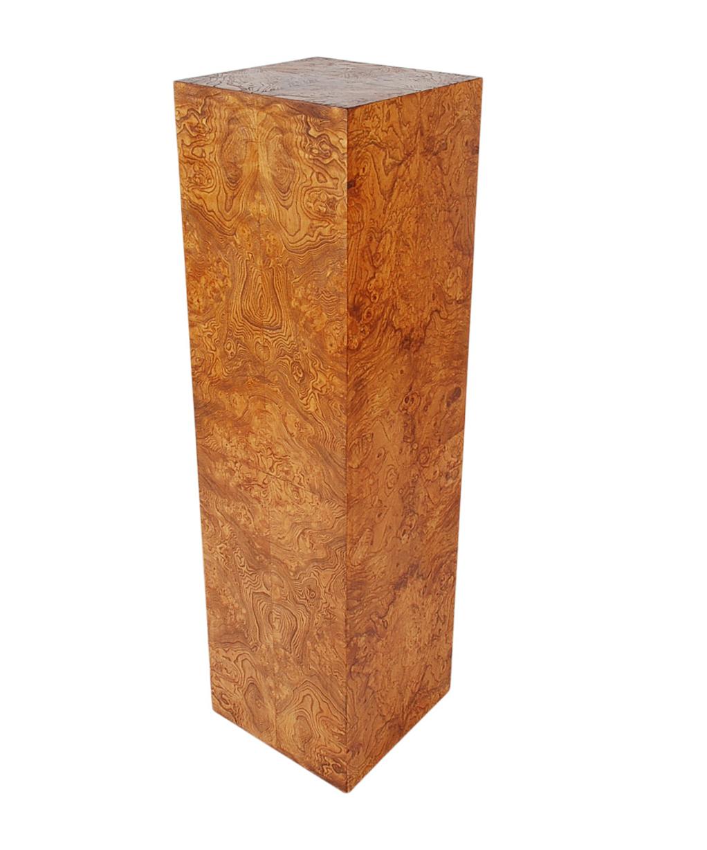 A gorgeous classic pedestal designed by Milo Baughman and produced by Thayer Coggin in the 1960s. It features solid wood construction with beautiful book matched olive burl. Clean and ready to use condition.